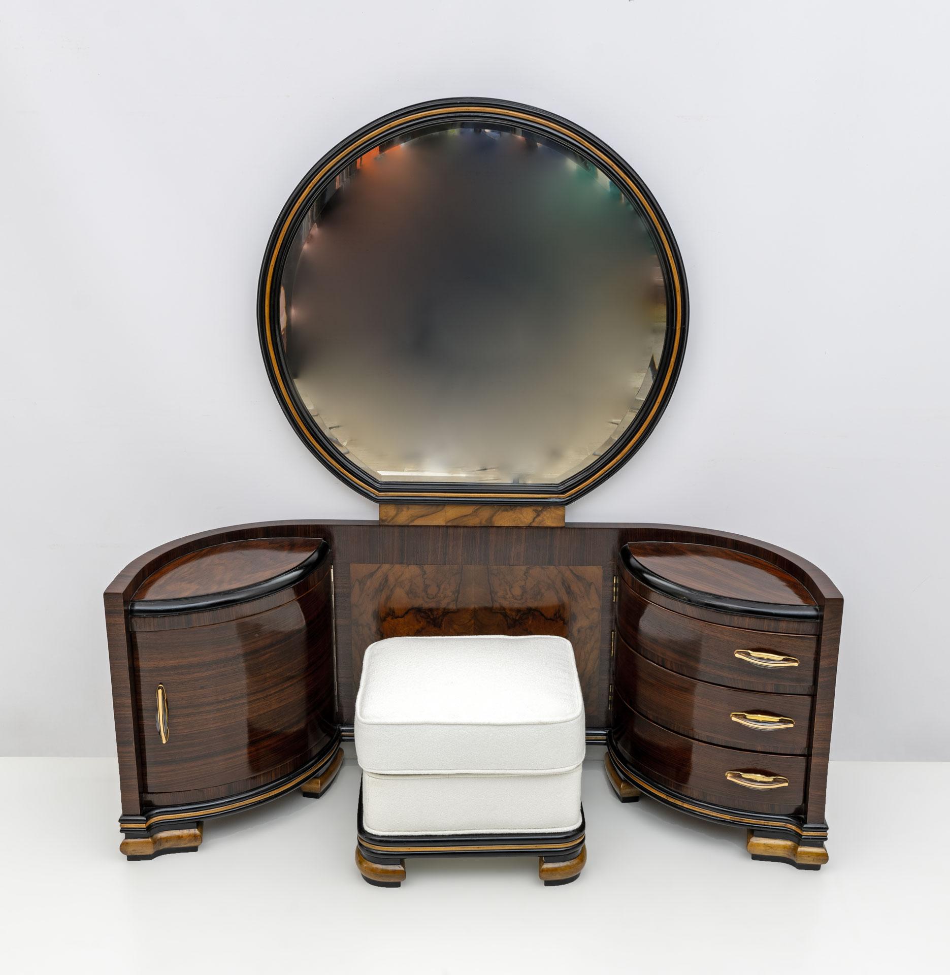Beautiful Art Deco dressing table produced by the historic Italian company from Brianza, Industria Mobili, Fratelli Mascheroni, with its pouf in walnut and ebonized wood. In the center, a large circular mirror is surrounded by two side containers,