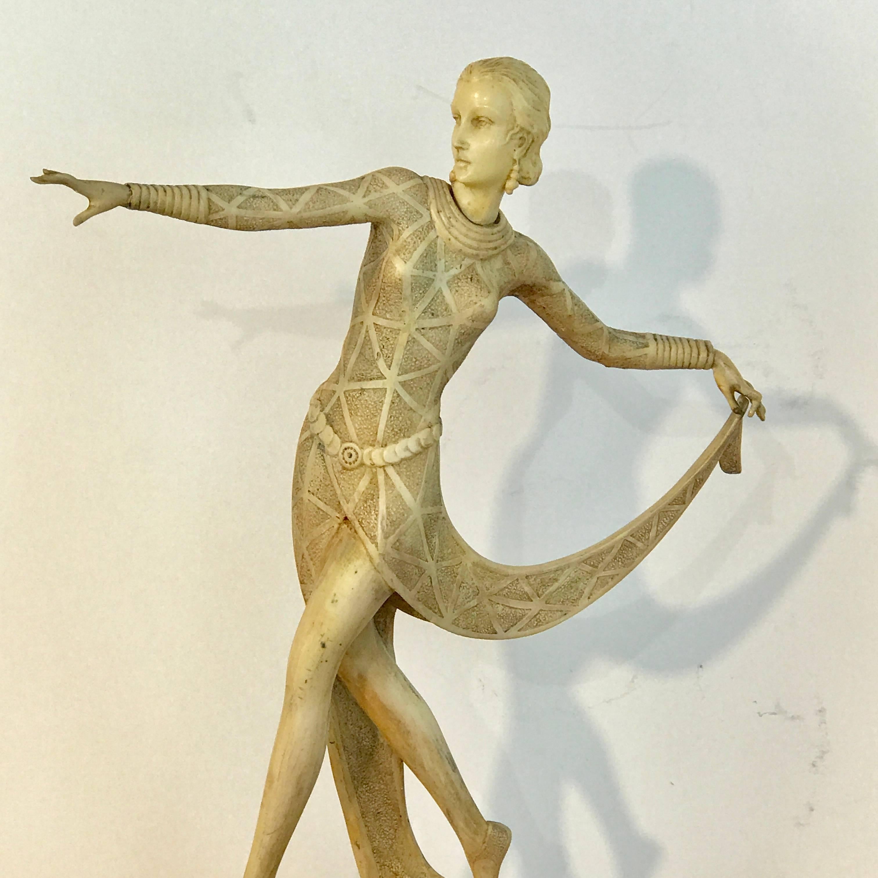 Art Deco Ivorine* dancer statue signed (Josef) Lorenzl, raised on a green onyx pedestal base
Ivorine is man-made substitute for ivory.