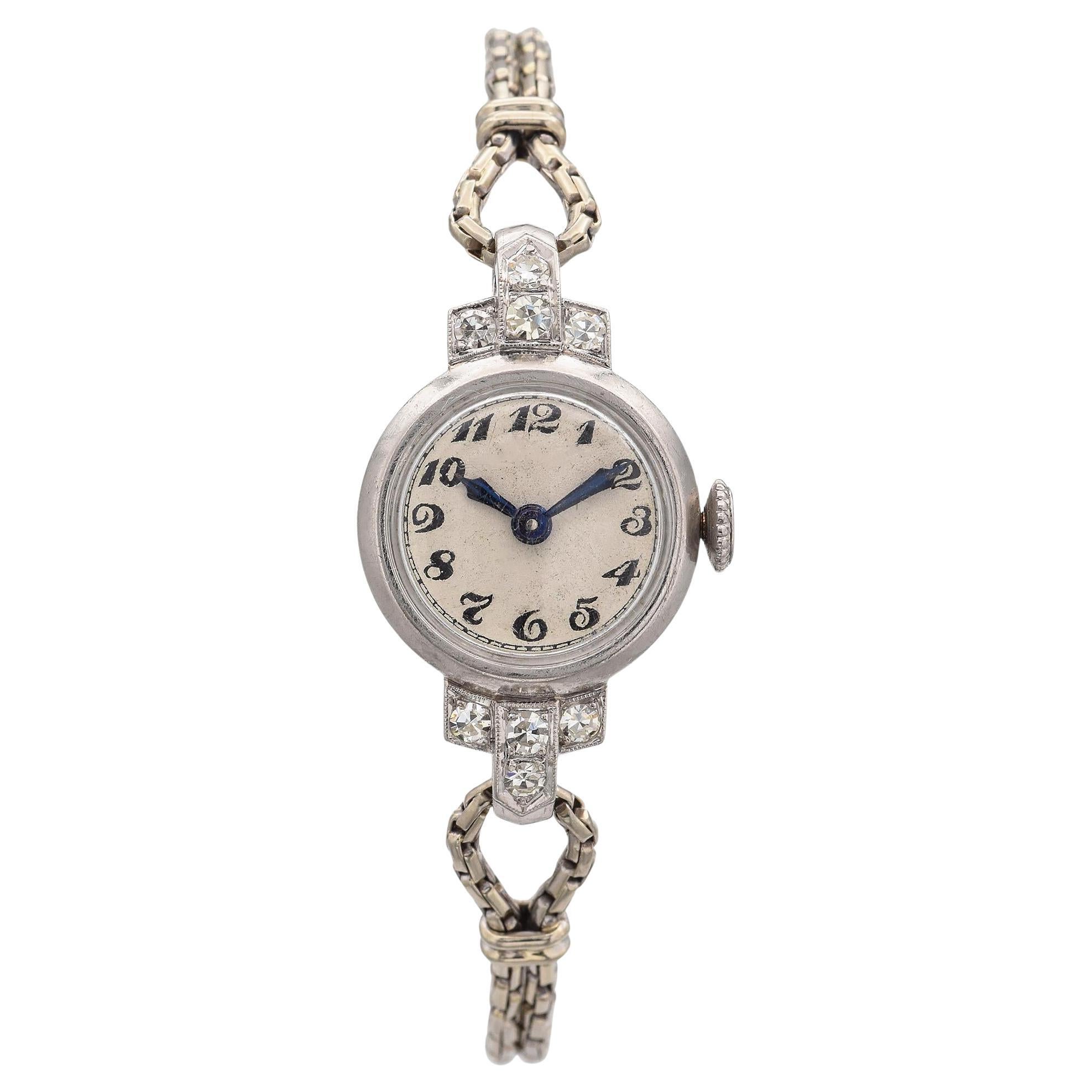 Reloj suizo Art Déco J. Schulz de platino y diamantes con pulsera de oro blanco de 14 quilates