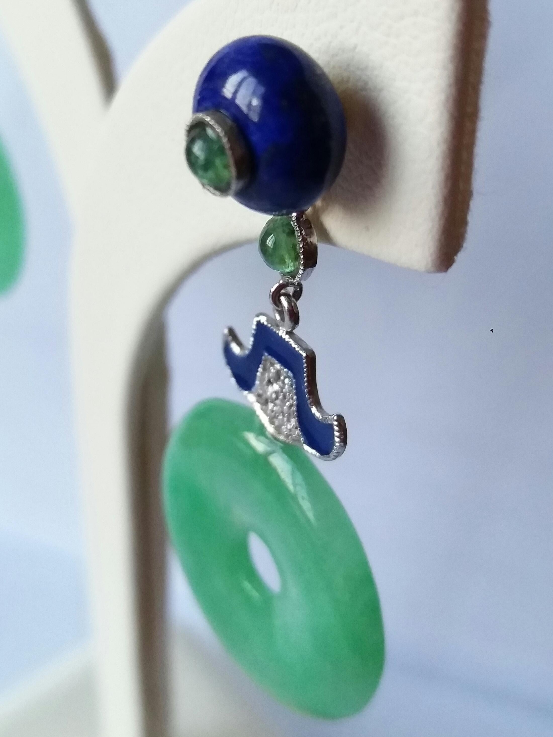Tops are 2 round Lapis Lazuli buttons with a small round emerald cabochon in the center , middle parts in white gold,small full cut round diamonds , 2 small round emerald cabochon and blue enamel , bottom parts are 2 plain Burma Jade donuts
In 1978