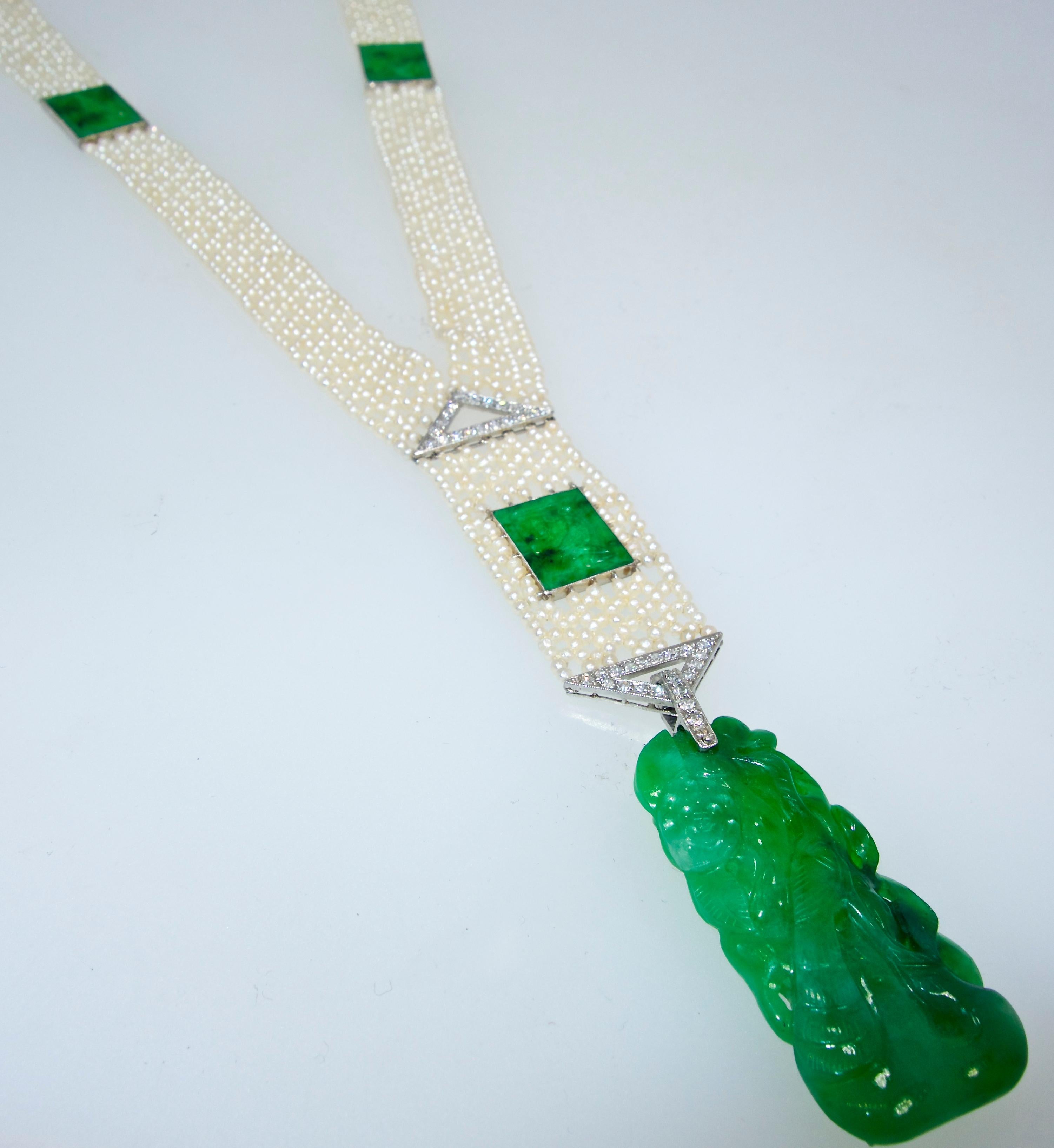 Art Deco Necklace Sautoir of braided natural pearls,  strung on silk and all finely matched with a deep luster.  This 30 inch (+) necklace is platinum with fine white diamonds and fine bright green natural jadeite jade.  The bottom carved jade