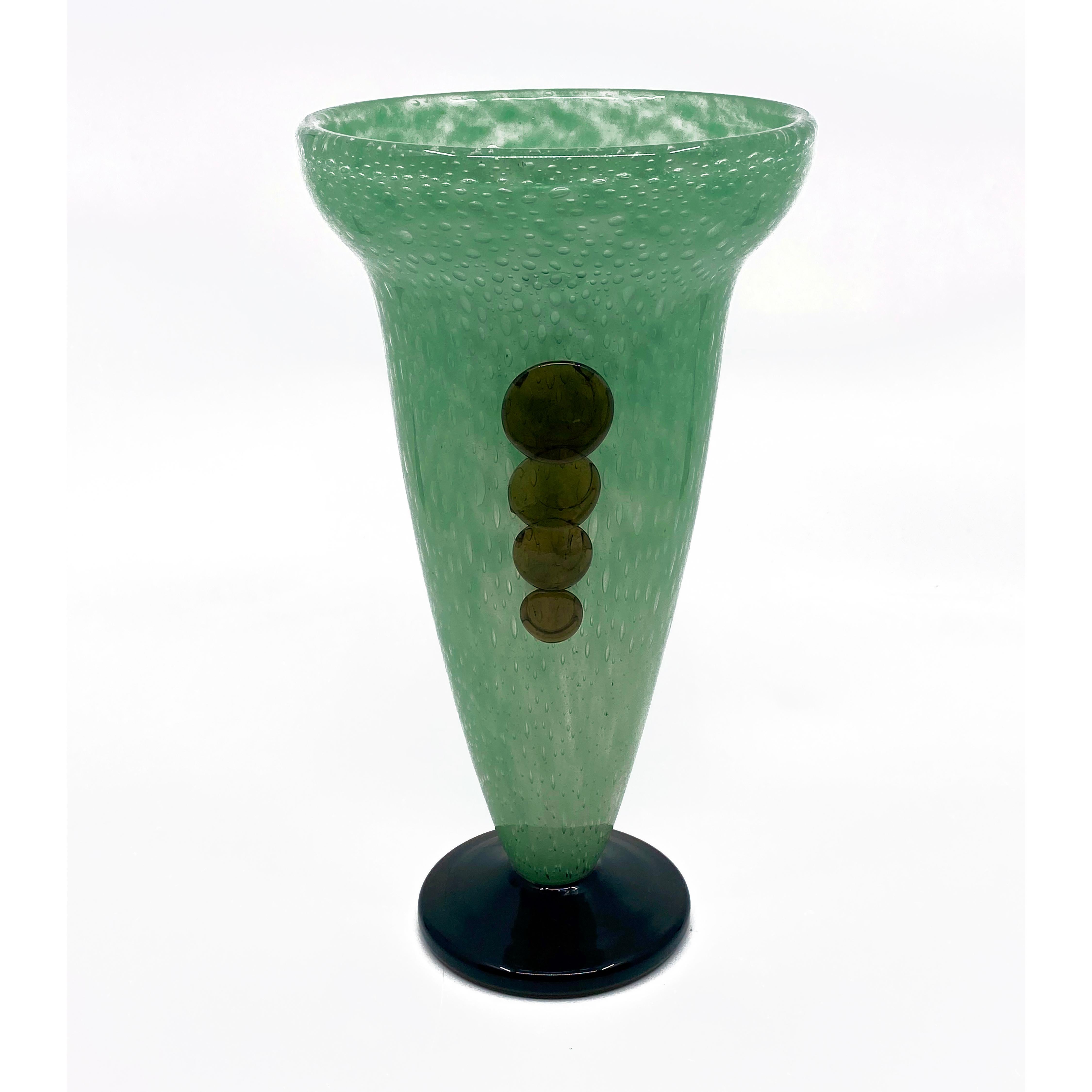 A green Jade Art Deco vase by Charles Schneider with applied glass dots along each side.
Made in France,
circa 1928
Signature: Schneider.