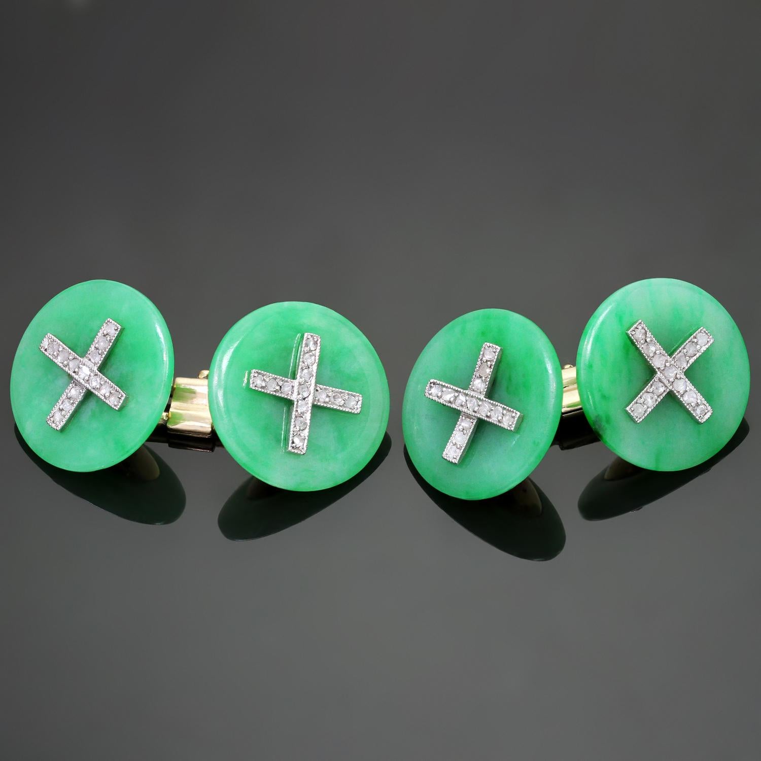 This handsome pair of rare button form cufflinks features circular green jadeite jade discs, accented with rose-cut diamonds set in platinum, and connected by 14k yellow gold links. The jade has not been tested for treatment. Made in United States