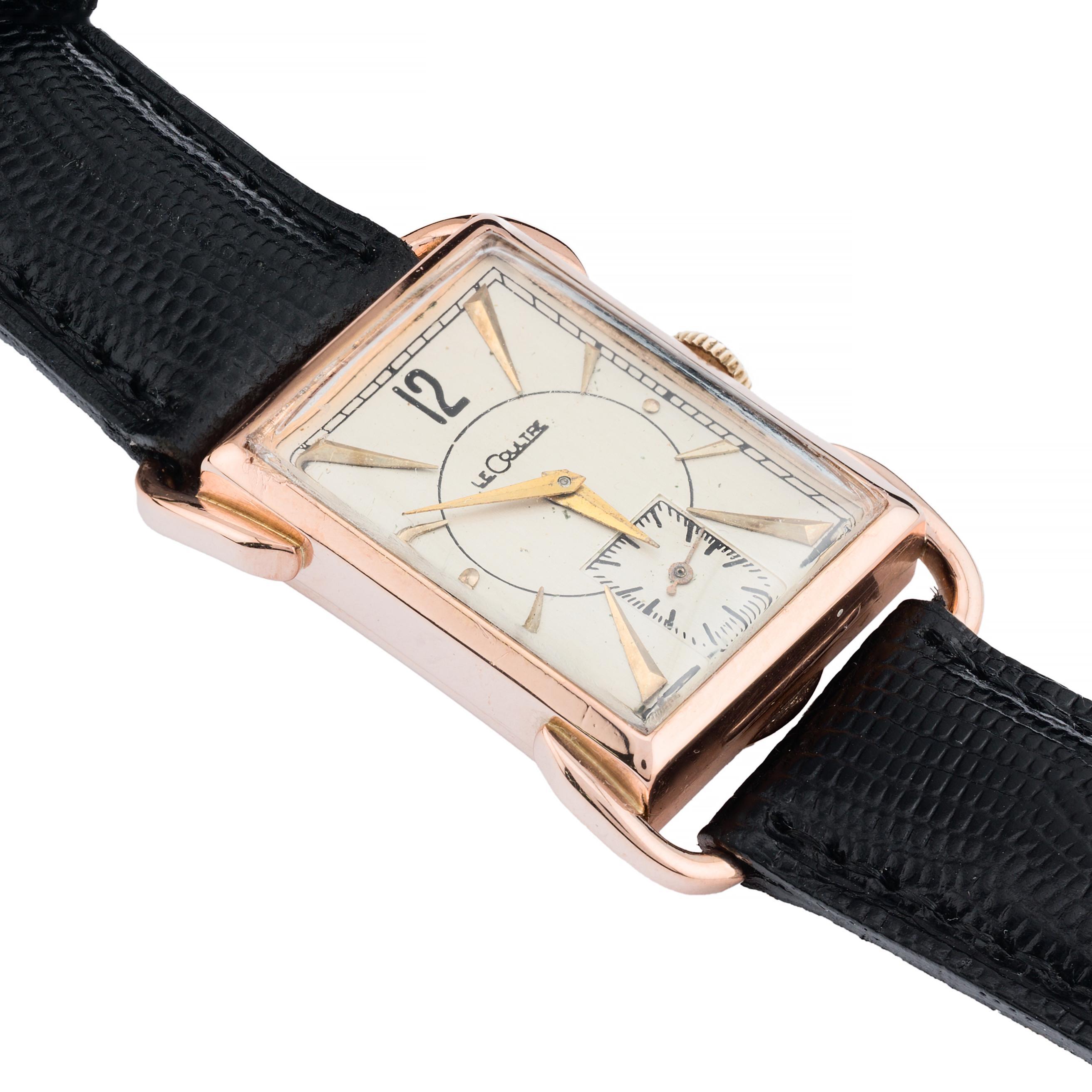 Aston Estate Jewelry Presents:

A Jaeger-LeCoultre 1940's timepiece, crafted with precision and elegance. This rectangular watch features a unique fancy lug case in 14 karat solid rose gold. Complementing the case is a multi toned silver dial,