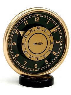 Reloj de chimenea de ocho días Art Déco Jaeger LeCoultre de latón dorado y cristal negro