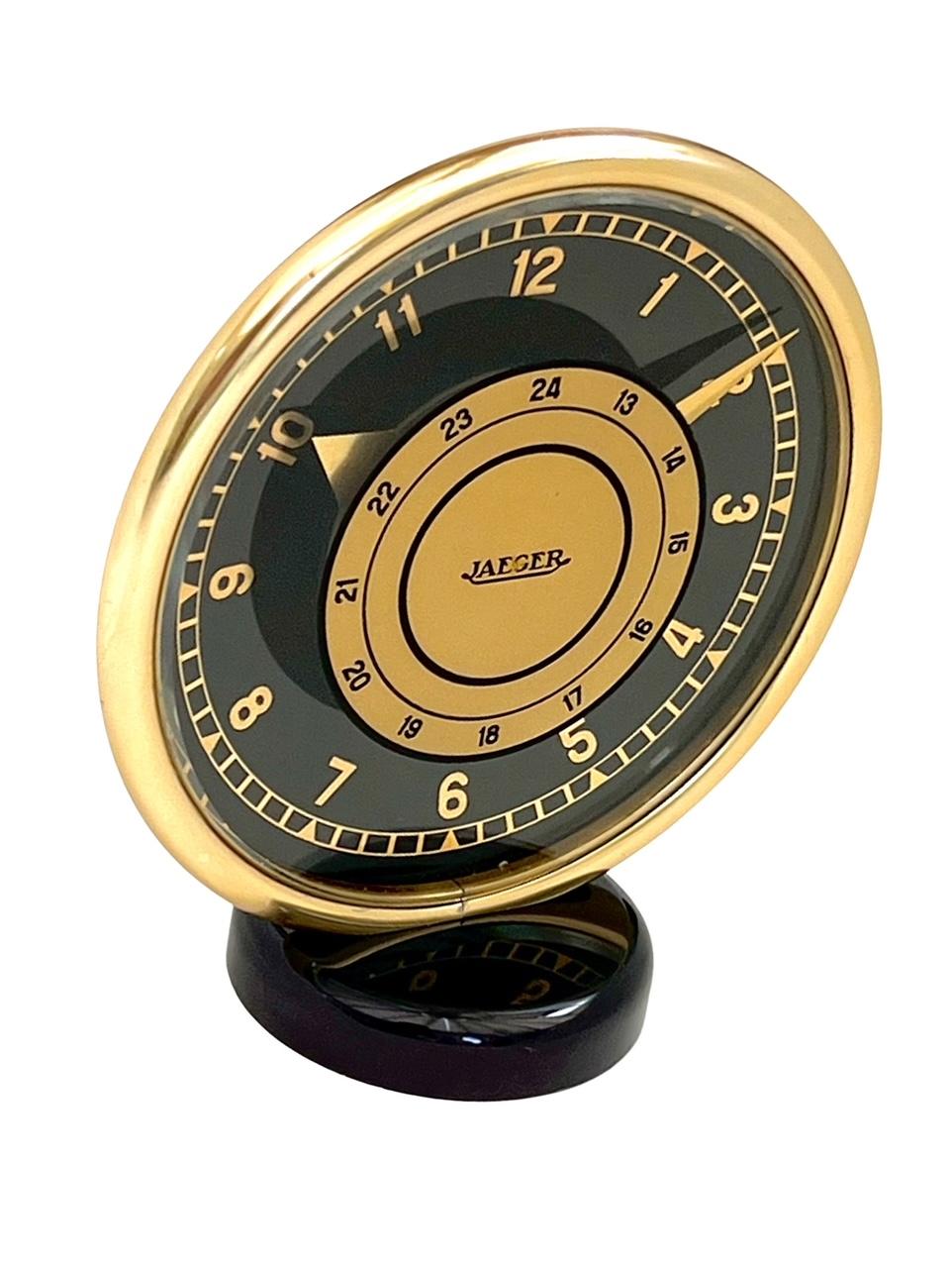 Mid-20th Century Art Deco Jaeger LeCoultre Gilt Brass and Black Glass Eight Day Mantel Clock For Sale