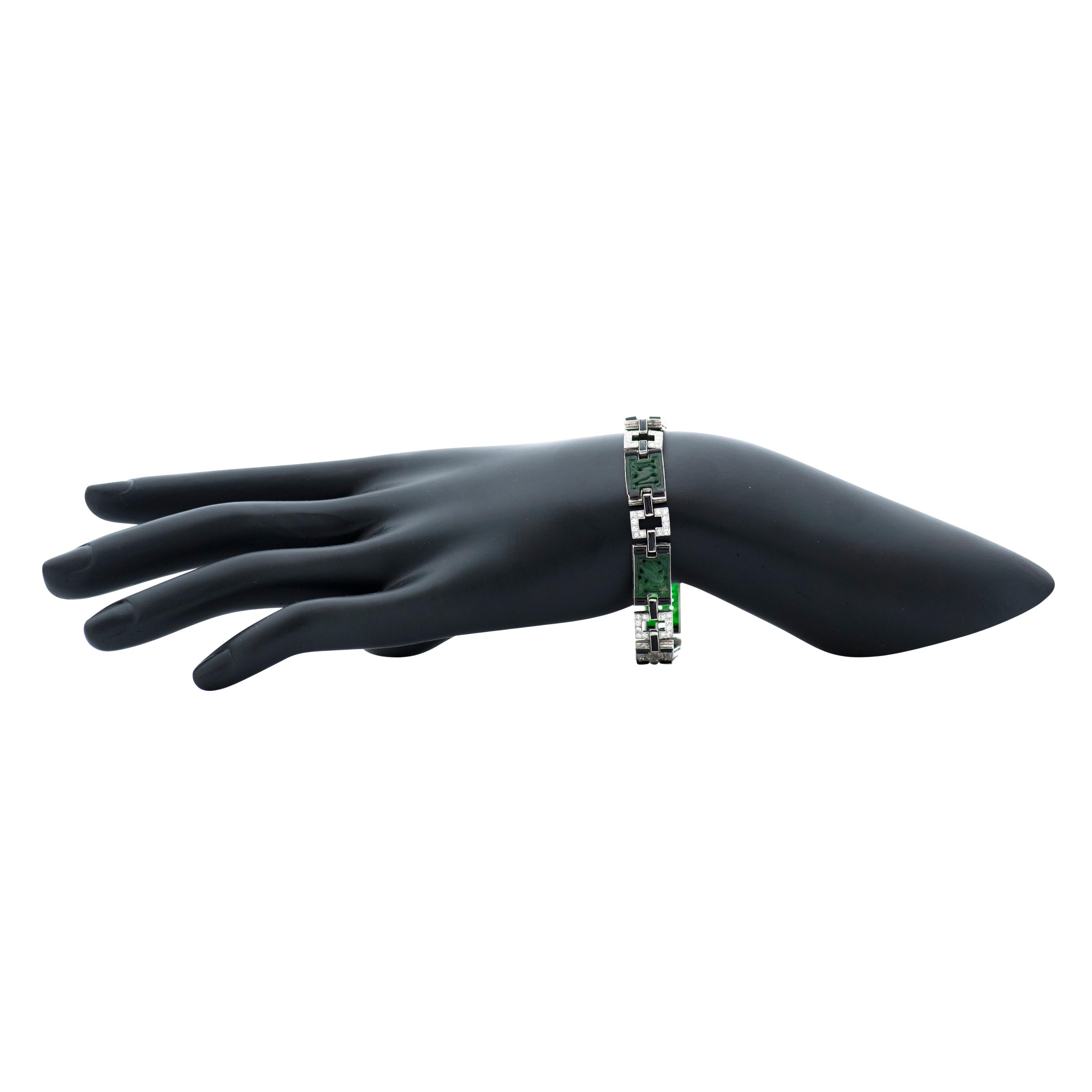 Taille simple Art déco J.E. Caldwell & Co. Bracelet sculpté en platine, onyx et diamants en vente