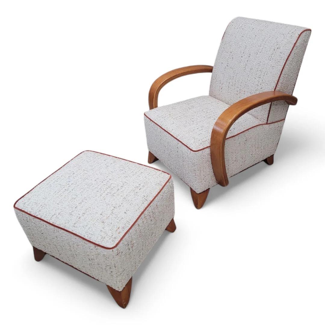 Sedia da salotto in legno curvato in stile Art Deco Jindrich Halabala e ottomana appena rivestita in Boucle

Prova l'eleganza dell'epoca Art Déco con questa sedia da salotto e ottomana in legno di Bentwood, realizzata nella Repubblica Ceca.