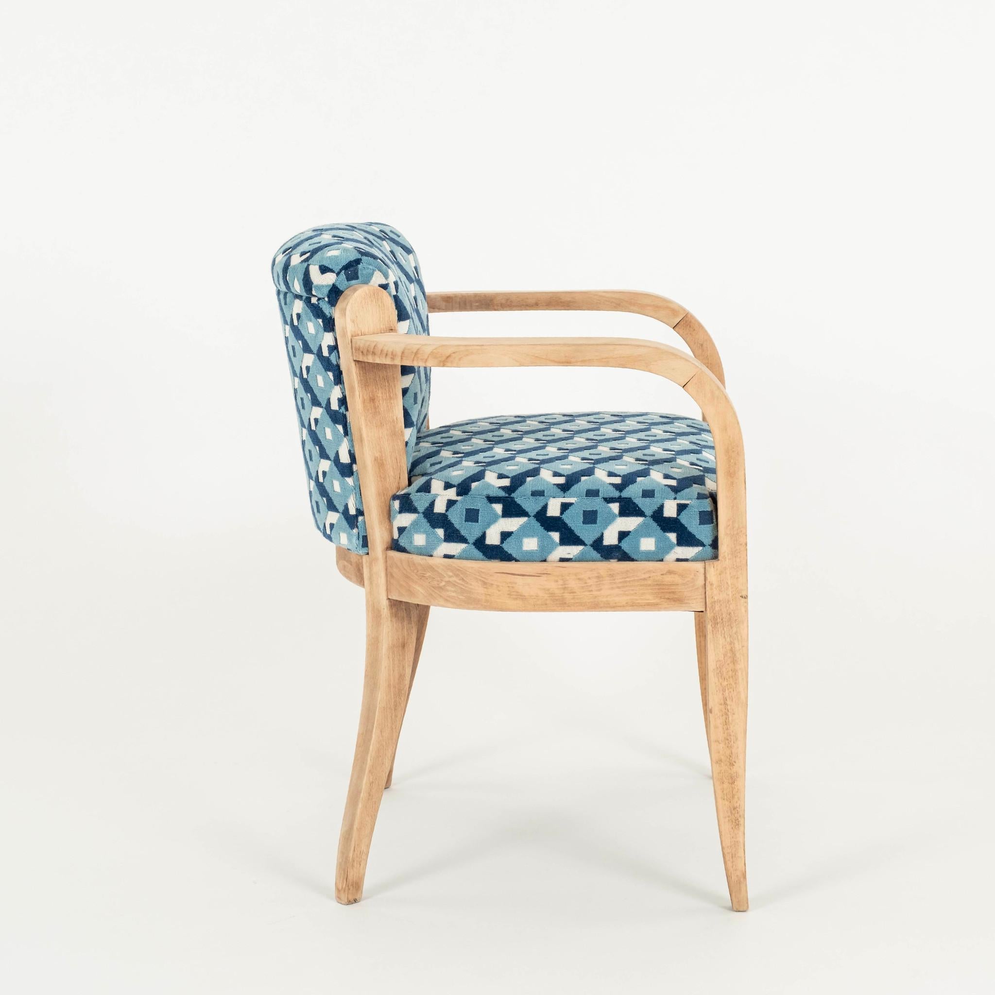 French Art Deco armchair: Blond wood with stripped back finish newly padded, upholstered in blue and white Dazzle Ship Johnson Hartig of Libertine Fabric for Schumacher. This is an all-over three-color geometric in verdant reminiscent of Op Art