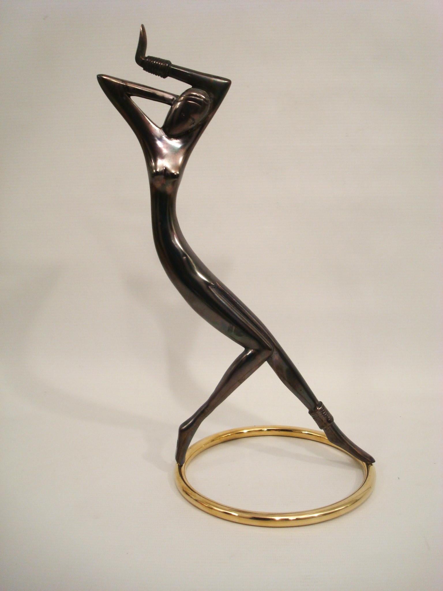 
Art Deco Hagenauer Bronze Figure of Josephine Baker, 20th century Impressed mark to foot: WHW

Hagenauer workshops were opened in Vienna in 1898 by Carl, the father of both Karl and Franz Hagenauer. It is the two sons contributions to the company,