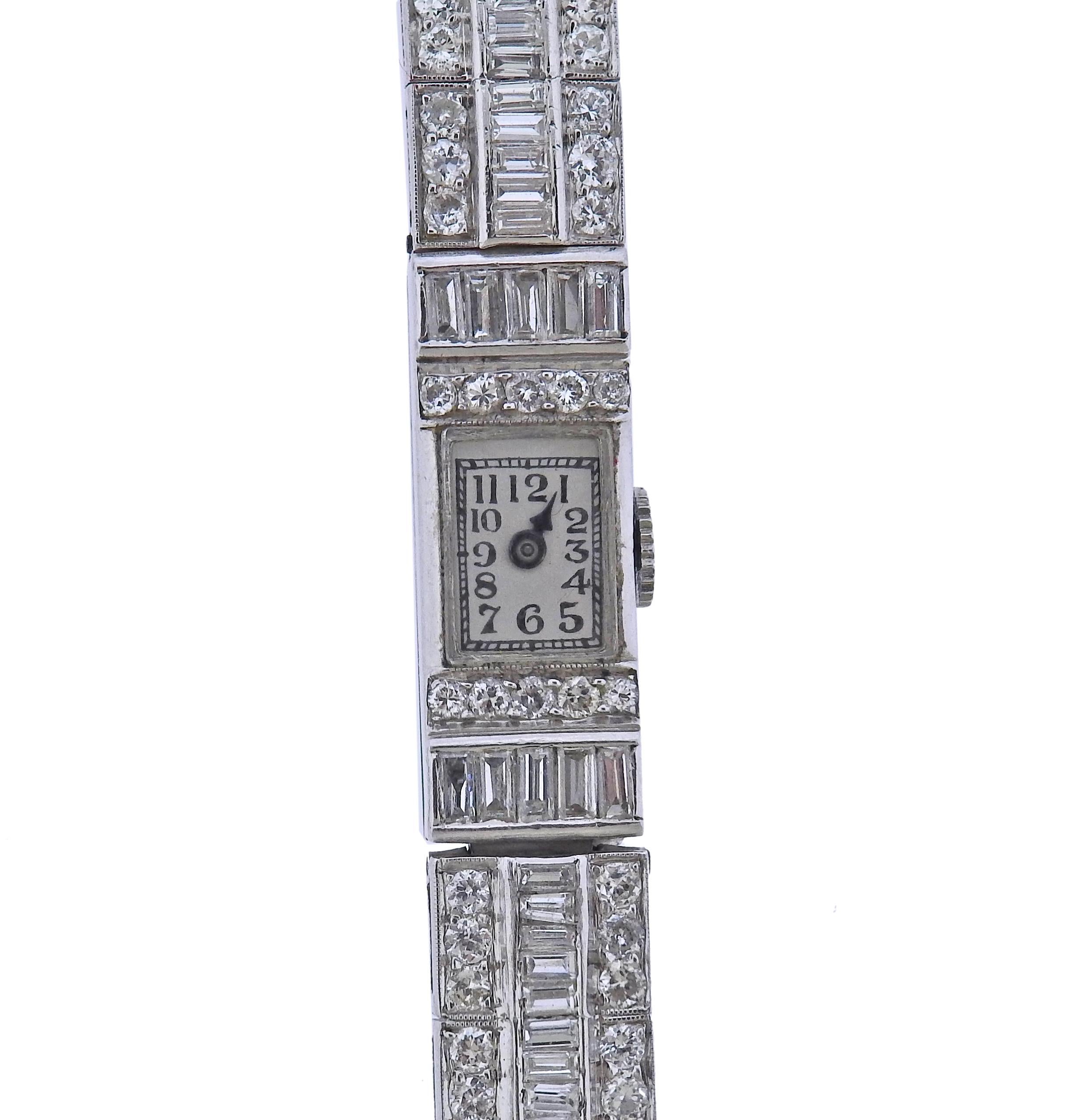 Art Deco platinum watch bracelet, with manual wind movement - working order. Bracelet decorated with approx. 3.00ctw in diamonds. Movement signed : 18 jewels, 5 pos, , Swiss, Jules Jurgensen & Co, # 17887. Bracelet is 6.5
