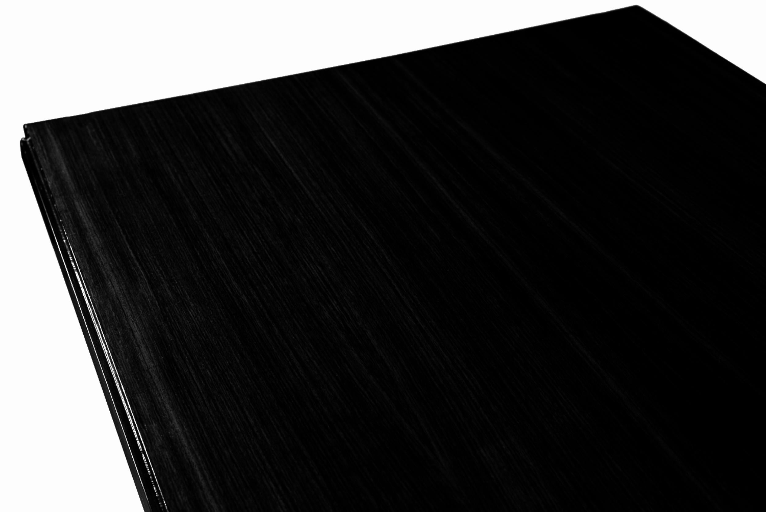 This stunning french dining table (1930s) features a classic  black lacquer varnished with elegant curves and integrated extensions, hardware and chromed small details, a Jules Leleu style Design piece.

Height: 74 cm (29.13 inches)

Width: 94.5 cm