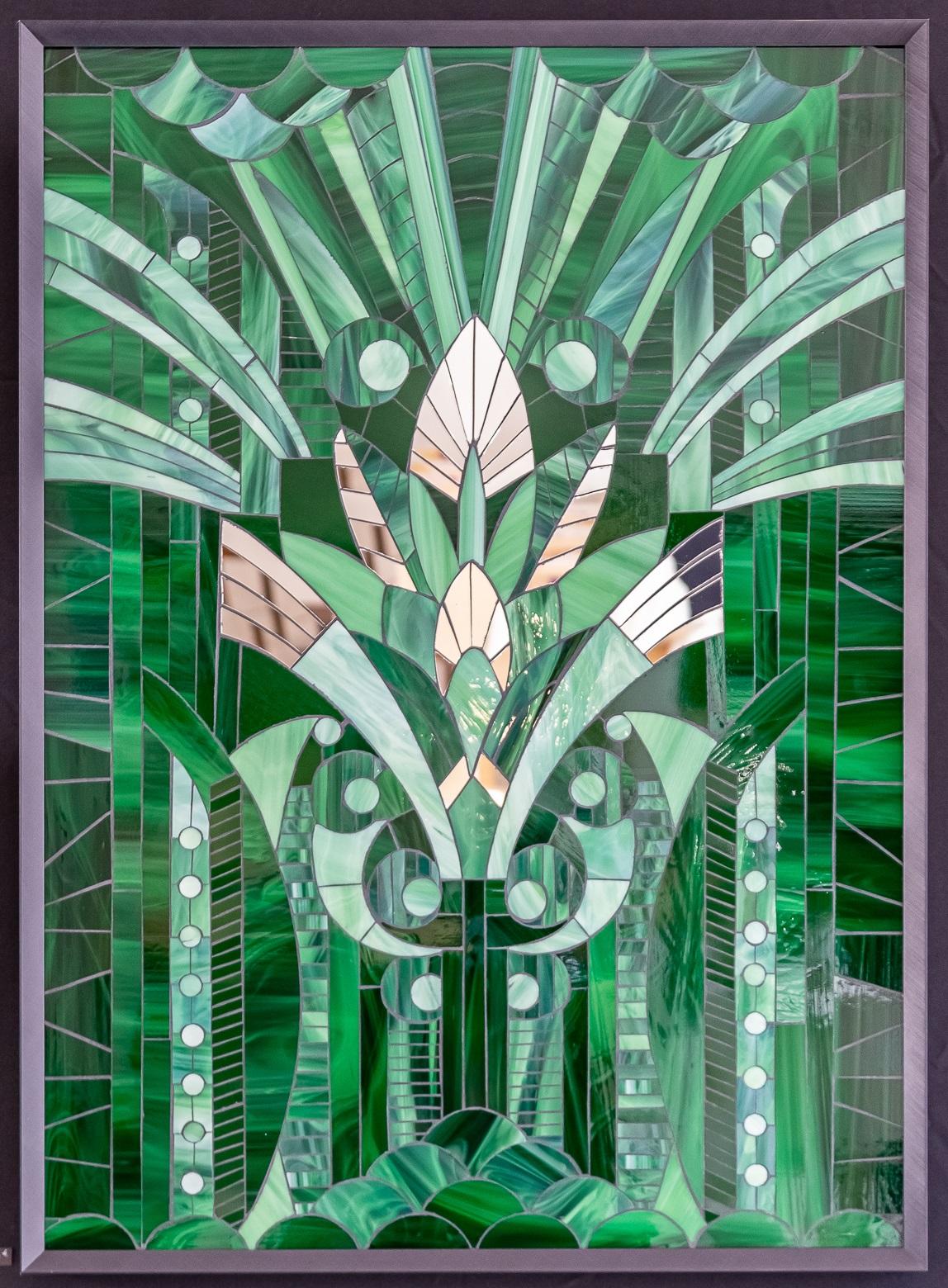 Art Déco jungle wall sculpture by Myriam Hubert.
Dimensions: W 60 x H 83 cm.
Materials: 'Glass marquetry' with mirror inlays.

Intended for residential and hotel interiors, Myriam Hubert's wall compositions evoke stained glass with a new