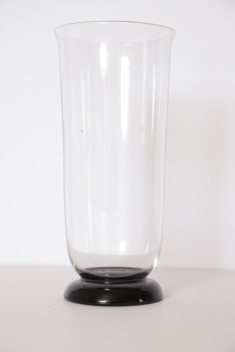 Art Deco Keith Murray glvss Vase for Stevens & Williams / Royal Brierley.

Uncommon Royal Brierley two-tone (crystal & black) signed glass vase designed by Murray.
Faint etched mark on base.
Murray's freelance work at S&W/Brierley was concurrent