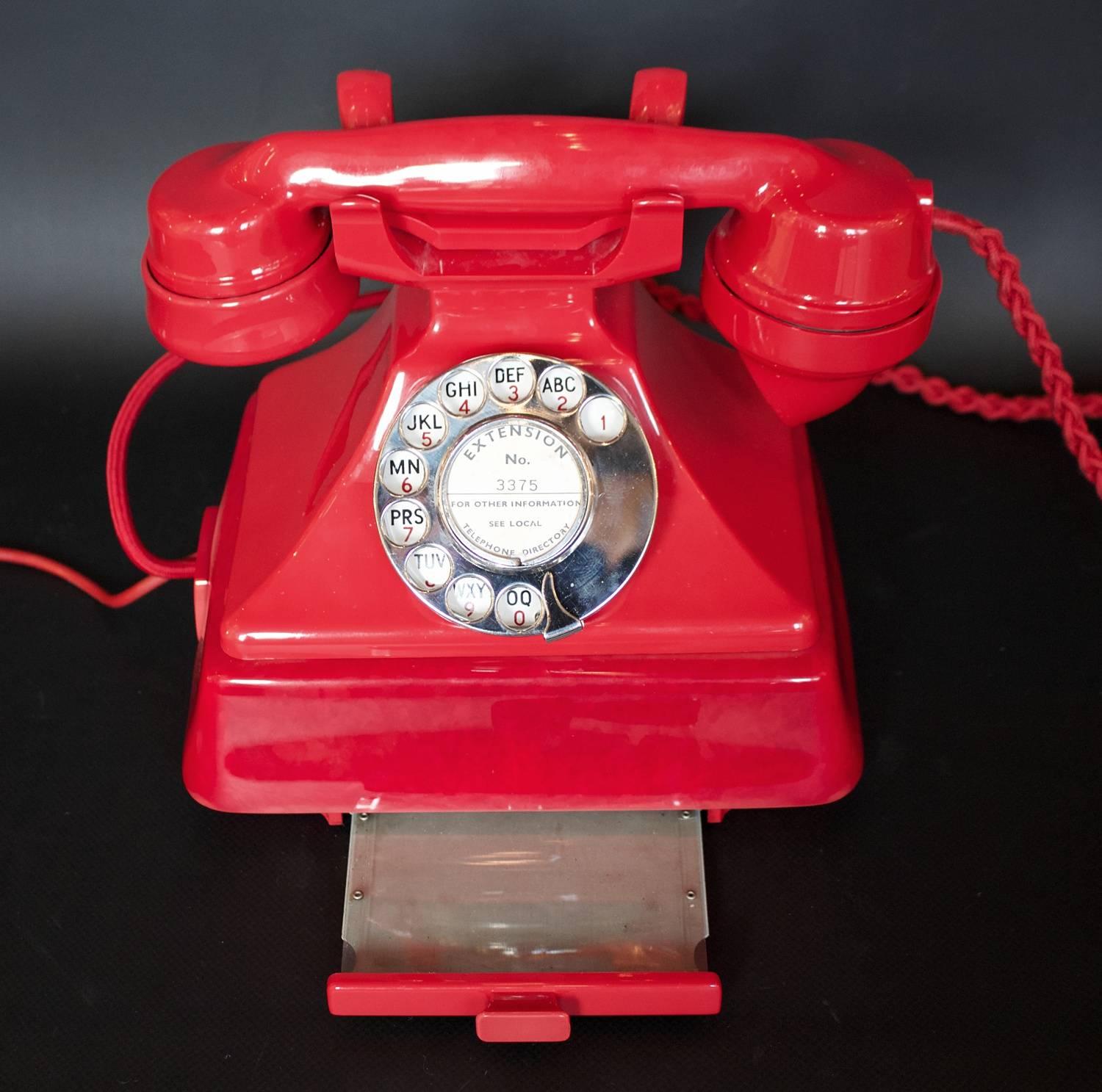 red bakelite phone