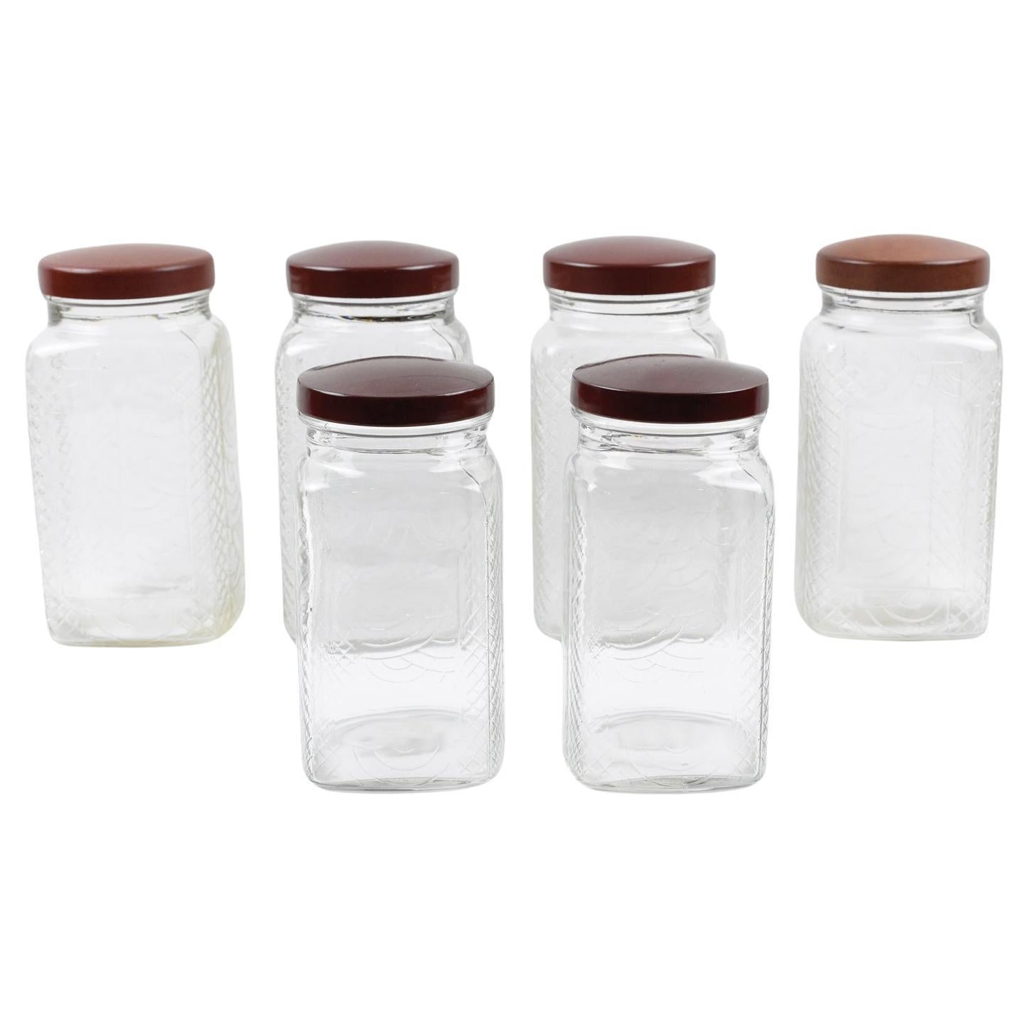 Art Deco Kitchen Canister Jar Molded Glass and Bakelite, 1930s, 6 pieces For Sale