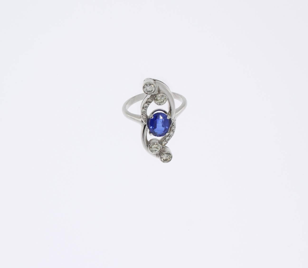 Set with faceted transparent blue Kyanite in oval shape weighing approximately 1,66 carat and 12 diamonds with a total weight of 0,80 carat, clarity VS1. Mounted in 18 K white gold. Hallmarked with the purity 750. Weight: 7,79 grams. 
Ring size 55 (