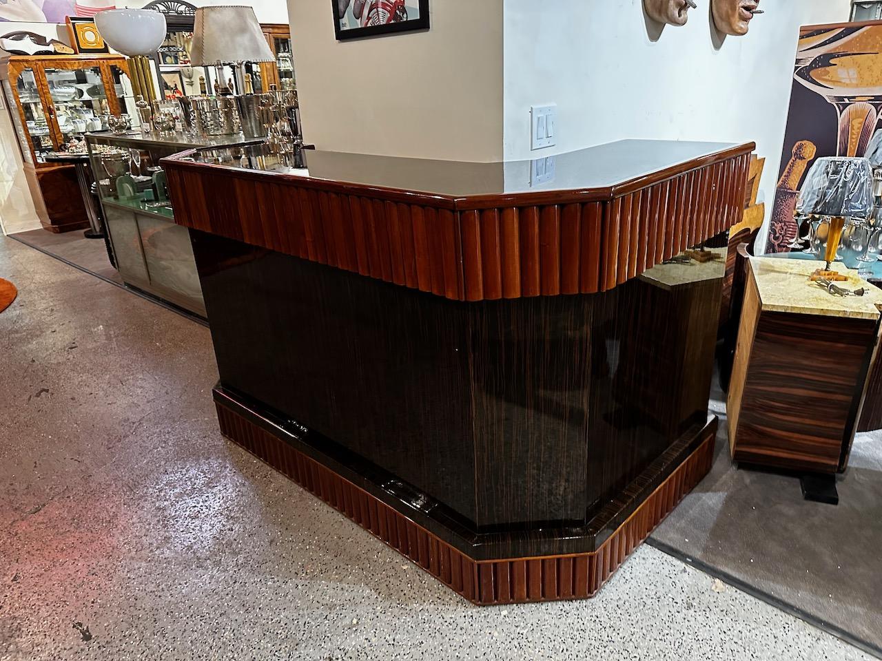 Art Deco L Shaped Stand Behind Macassar Bar and 3 Bar Stools. Original and restored bar with many extra storage features in the back, multiple shelves, drawers, and space to outfit even the most over-stocked back bar. The L shape of the bar is great