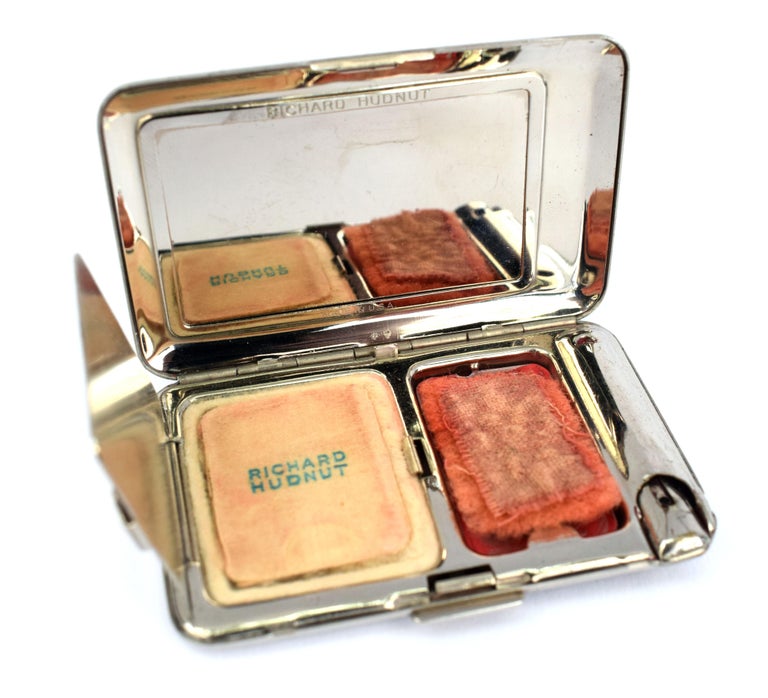 This is an incredibly rare 1930s Art Deco double compact by Richard Hudnut. One of the main criteria’s which command high desirability and collectability is condition and this compact has it in abundance. So often found with flaking enamel or specs