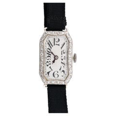 Montre-bracelet Art déco pour femmes Exploding Number en platine et diamants