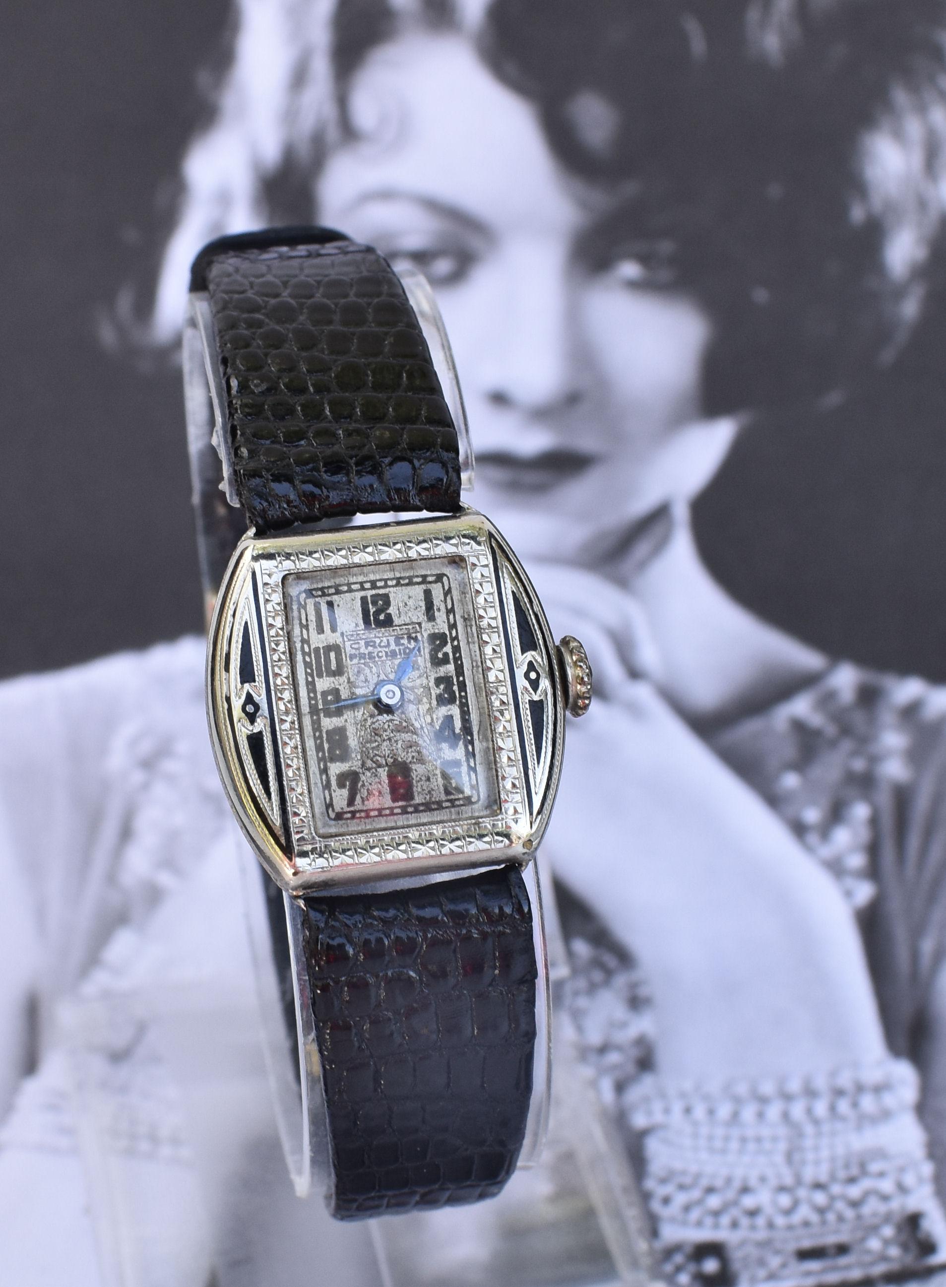 For your consideration is this truly beautiful ladies original Art Deco manual wrist watch with original strap. The main case is engine turned 14k white gold filled with enamel as accents. Heavy art deco decorative engraving to the case and superb