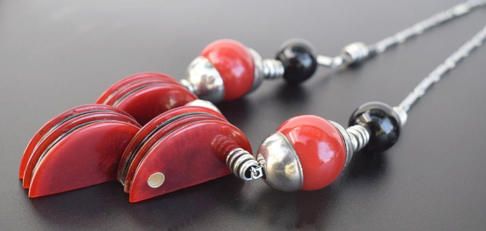 Fabulous Modernist statement necklace with the most desirable and exquisite detailing and craftsmanship, if you love Art Deco then this should be making your heart skip a beat. Features cherry red and black Galalith ( French version of bakelite)