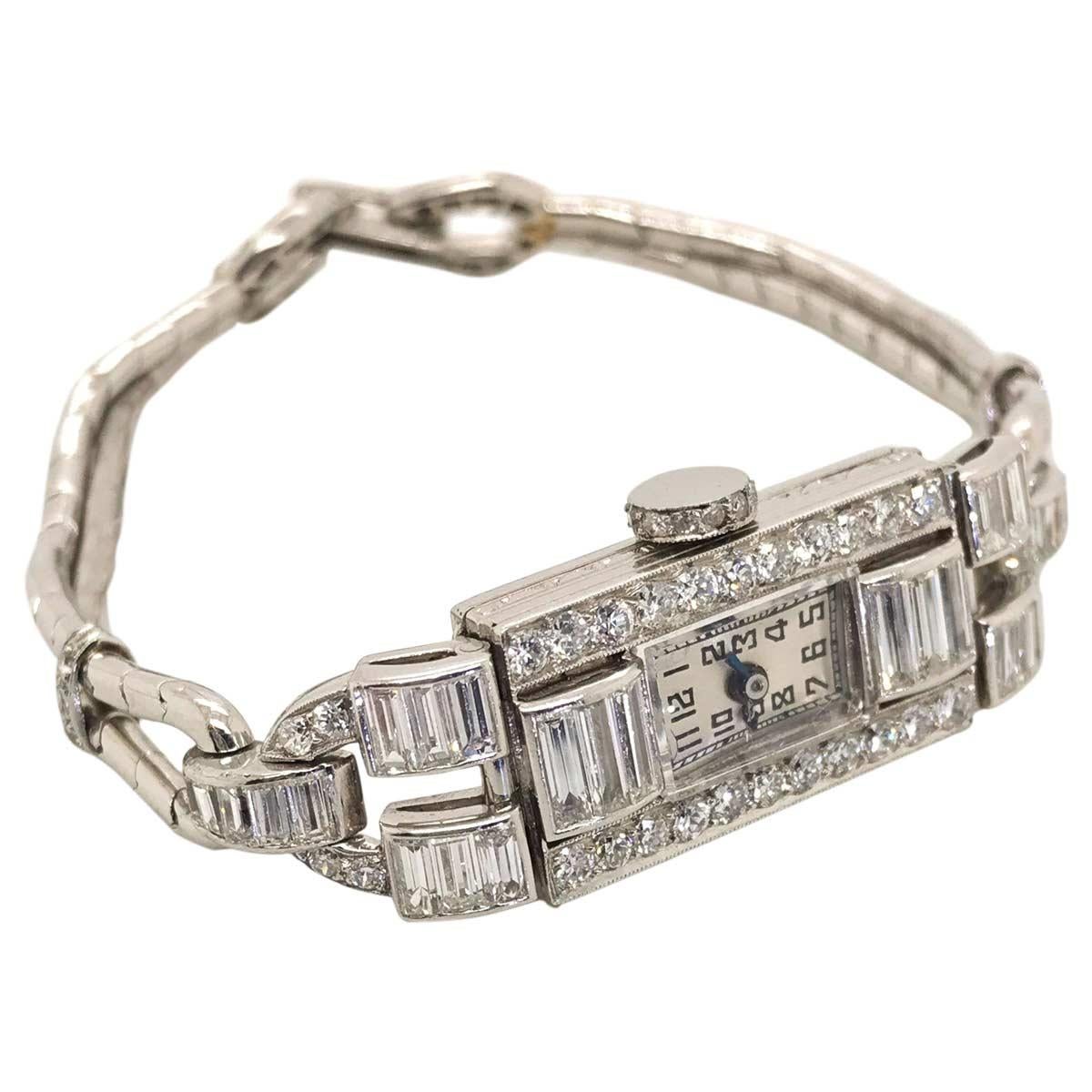 Imagine the 1920's, beaded flapper dresses, glittering headbands, multiple Deco diamond bracelets on one wrist and of course a fabulously stylish cocktail watch on the other. This one fits the bill perfectly, an original with the most stunning