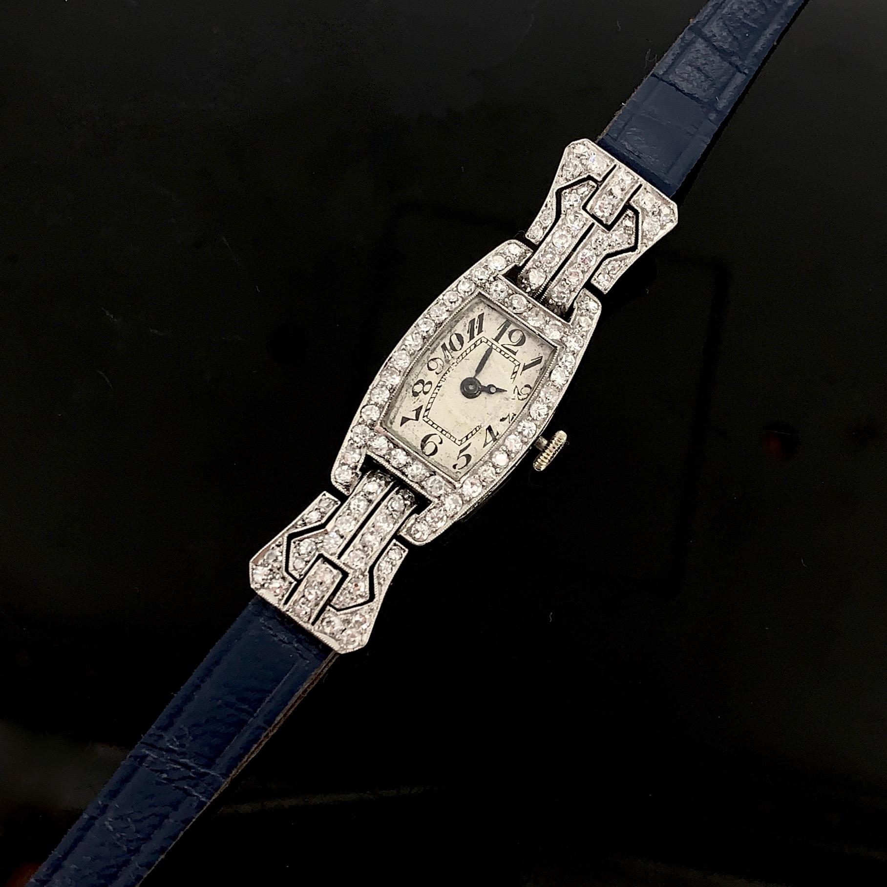 This timeless wristwatch fully made in platinum and it comes directly from the Art Deco era. It is adorned with single cut diamonds with a total carat weight of 1.40ct approximately. The watch is an automatic one and works perfectly. It was also
