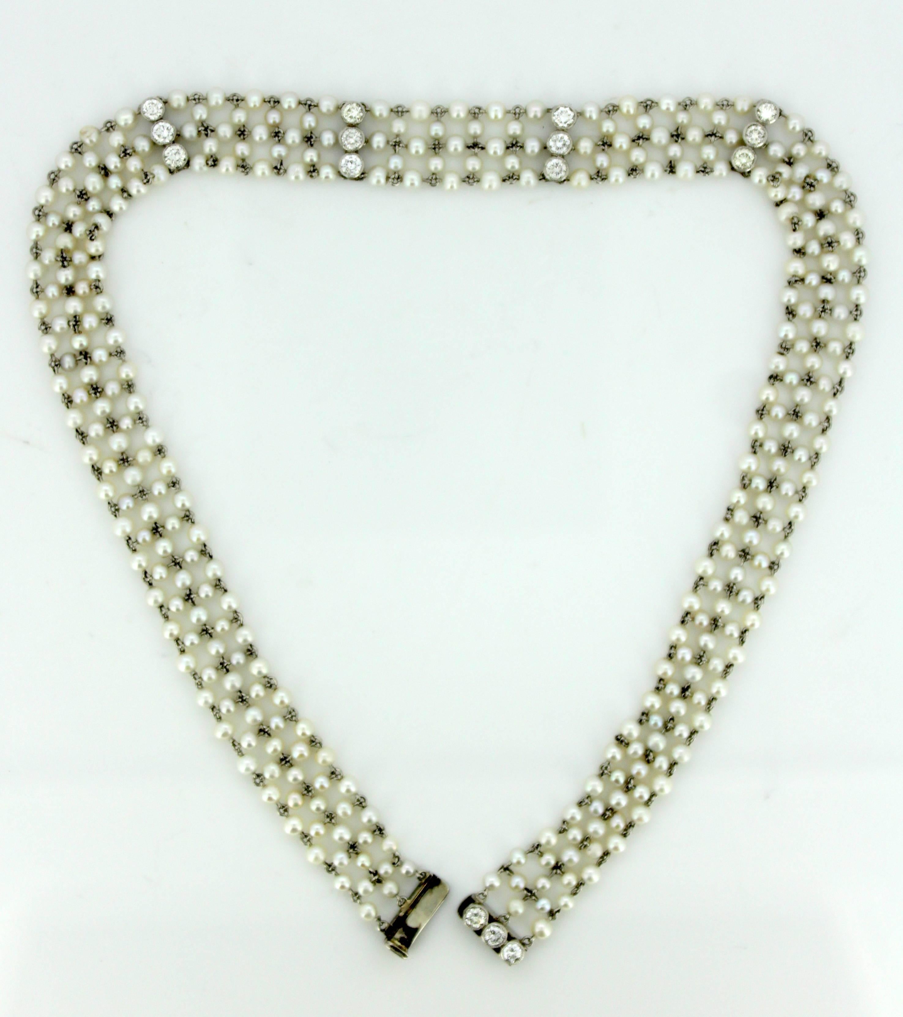 Art Deco Ladies Platinum Freshwater Pearl Choker Necklace With Diamonds (1.05 CT)
Made in France Circa.1920's.

Dimensions -
Length x Width : 36.5 x 1.3 cm
Weight: 22 g

Diamonds - 
Cut : Round
Total Number of Diamonds : 15
Cut : Round
Clarity :