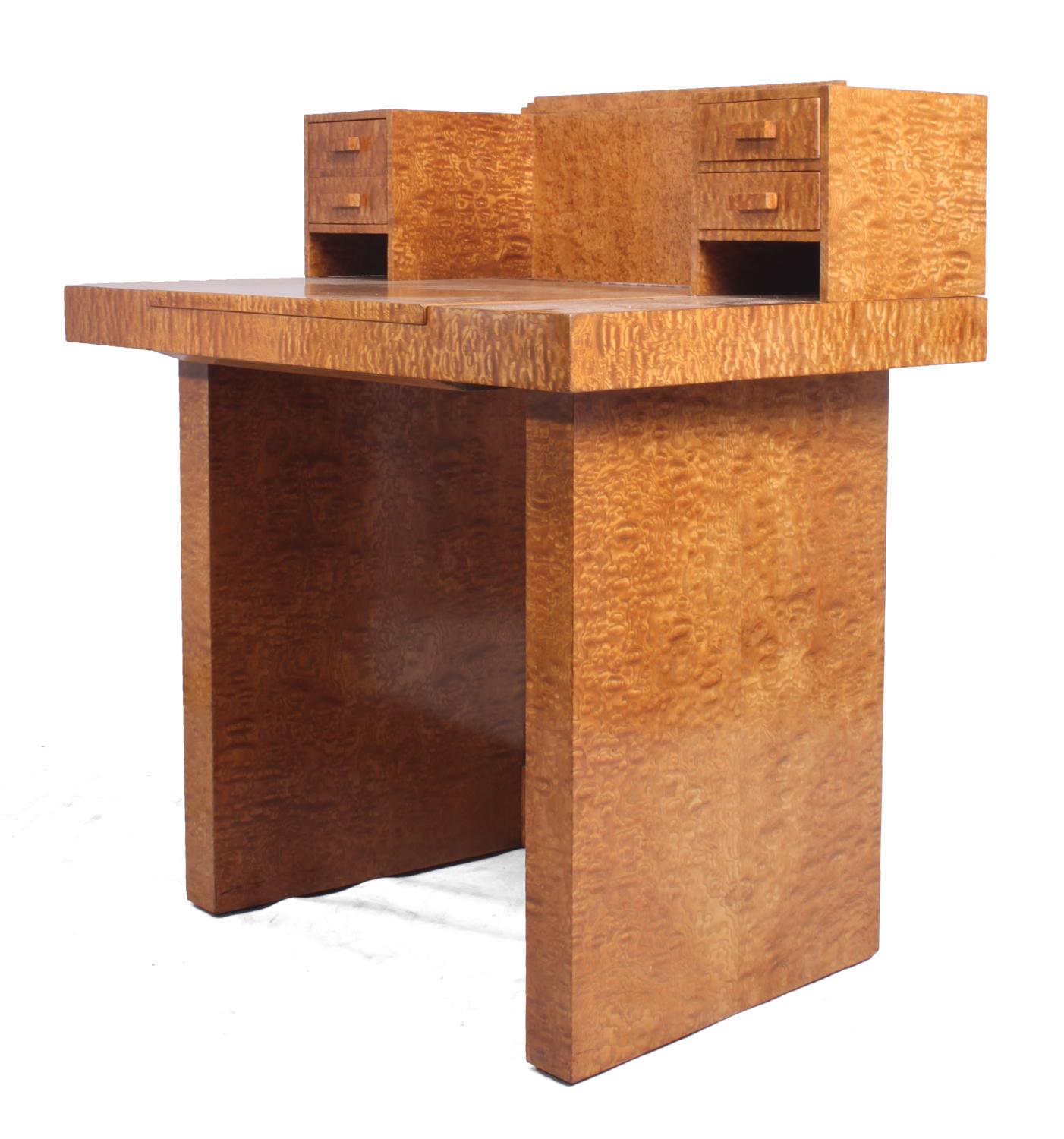Art Deco ladies writing desk and chair, circa 1930
Produced in France in the 1930s using Tamo Ash, it has a lift up lid, and super structure on the back the left drawer is double depth and two drawers on the right. These have handcut dovetail