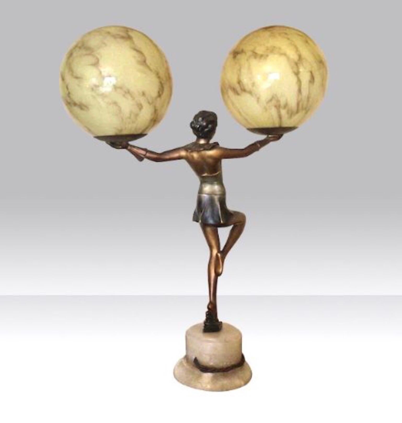 French Art Deco Lady Lamp Holding Aloft a Pair of Marbled Globes