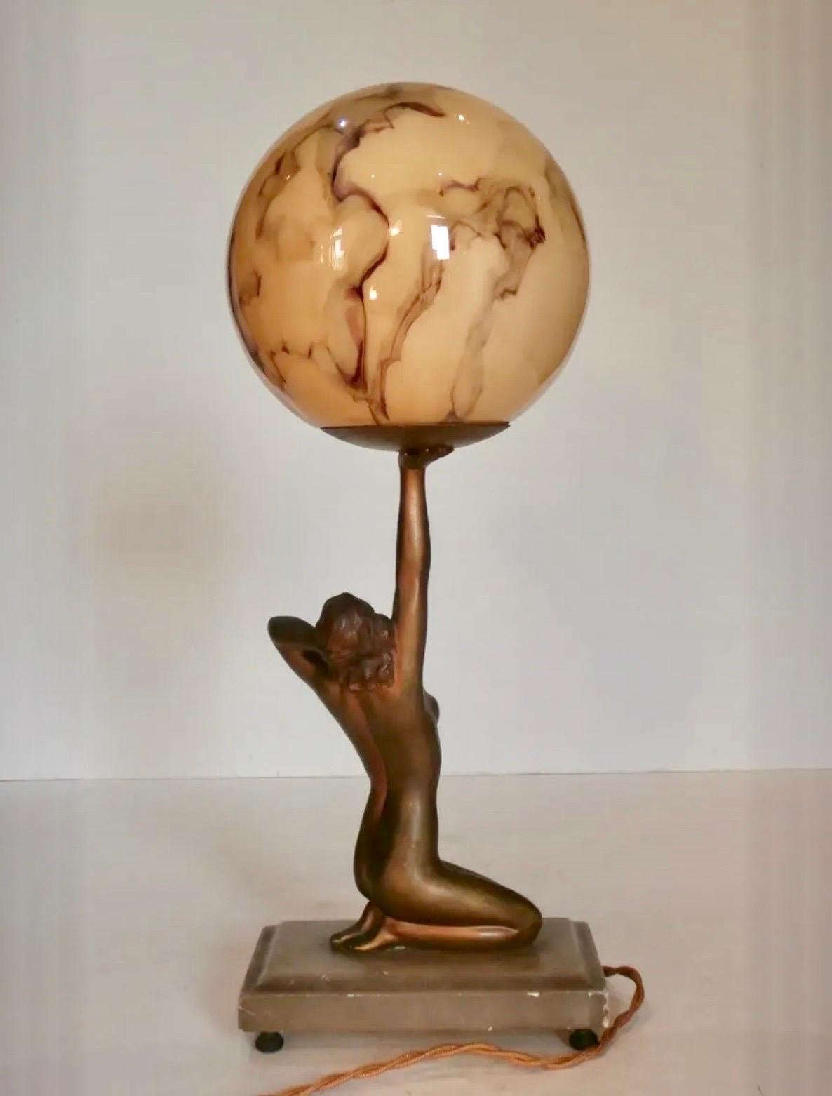 art deco lamp woman holding globe