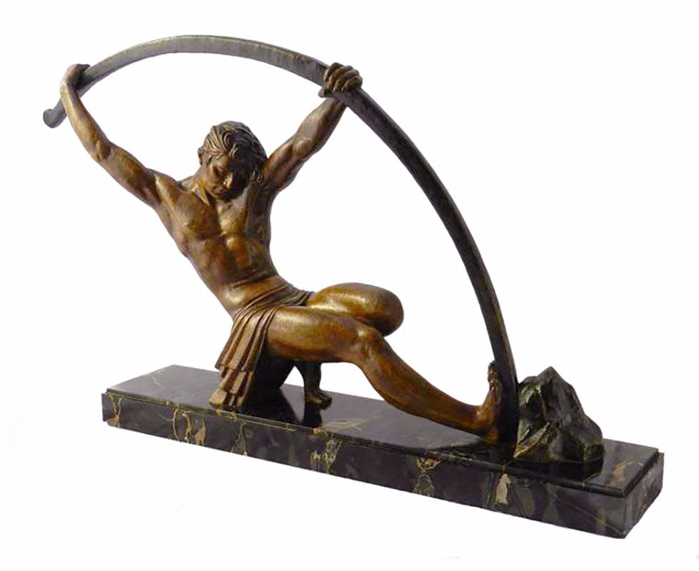 Original large Art Deco sculpture 'L'Age Du Bronze,' by Demetre Chiparus metal sculpture, circa 1925
A powerful French statue sometimes referred to as the famous 'bending bar man'
It was made in two sizes and this one is the much rarer larger