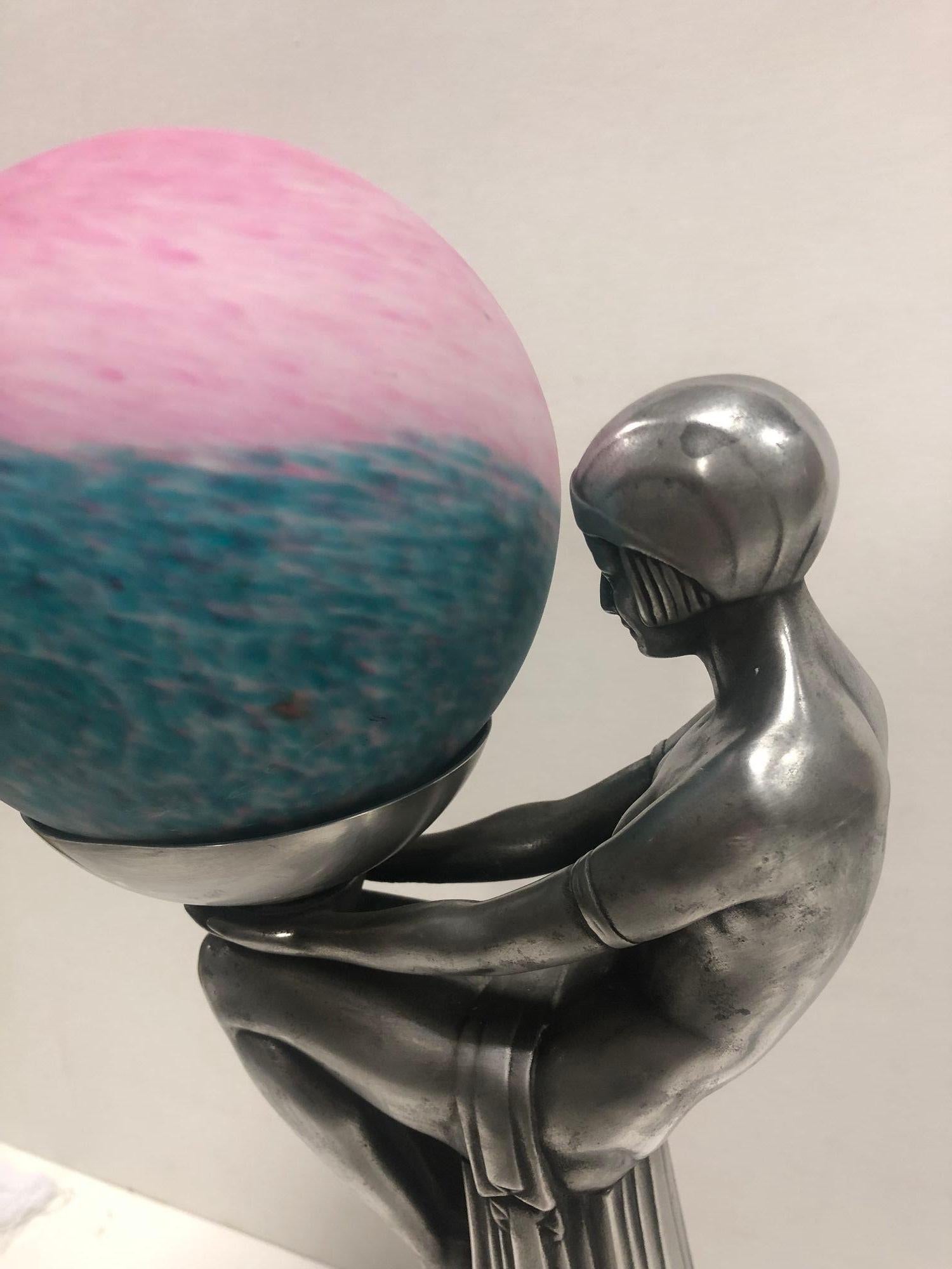 Early 20th Century Art Deco Lamp Figurine Lady Holding Colored Globe For Sale