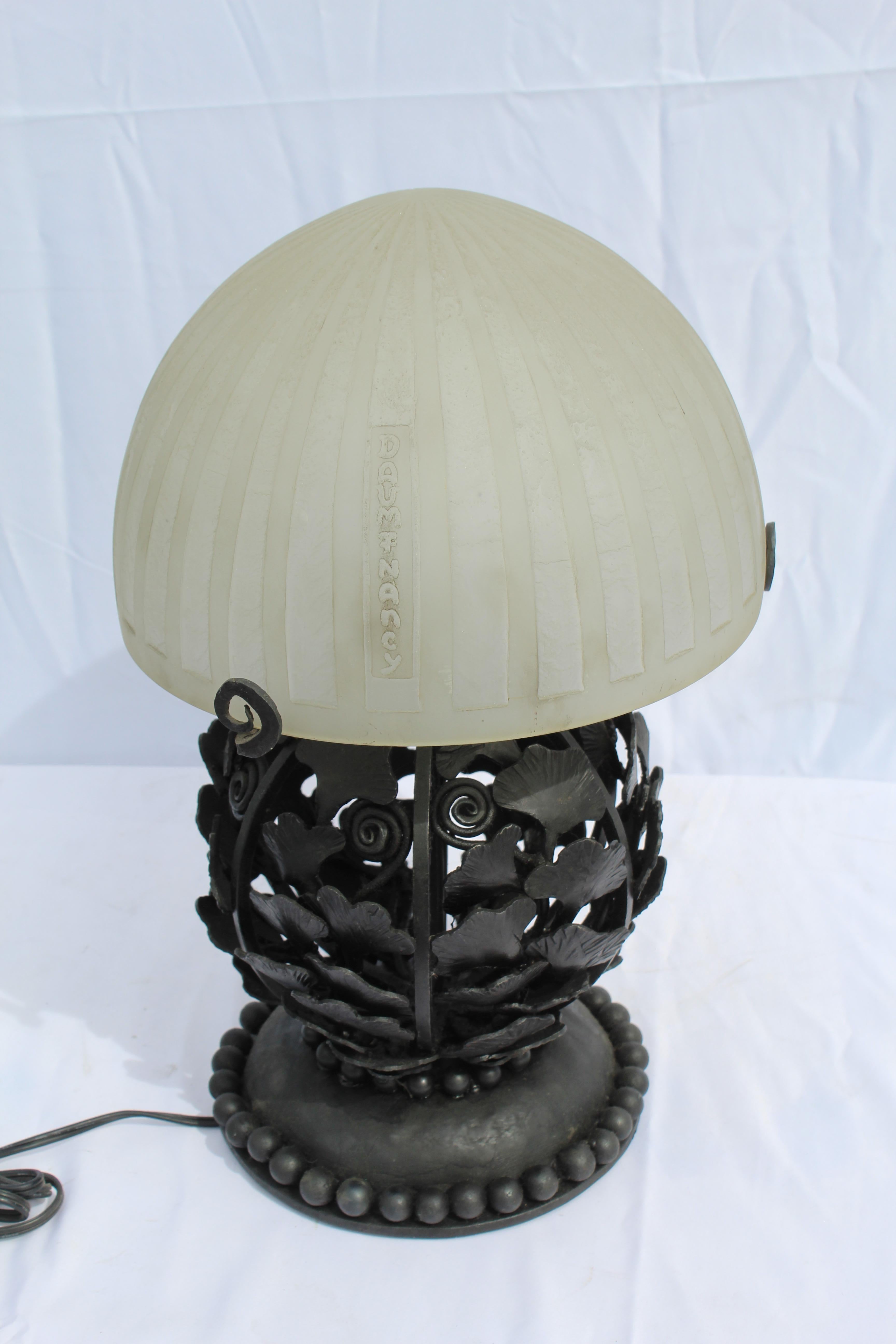 Art Deco Lamp made after the great E. Brandt and with a Daum style acid cut shade. Shade with name shown. All after the original. Excellent metal work of Ginko leaves. Heavy base . From a private Art Deco collector. This is a very rare style of Deco