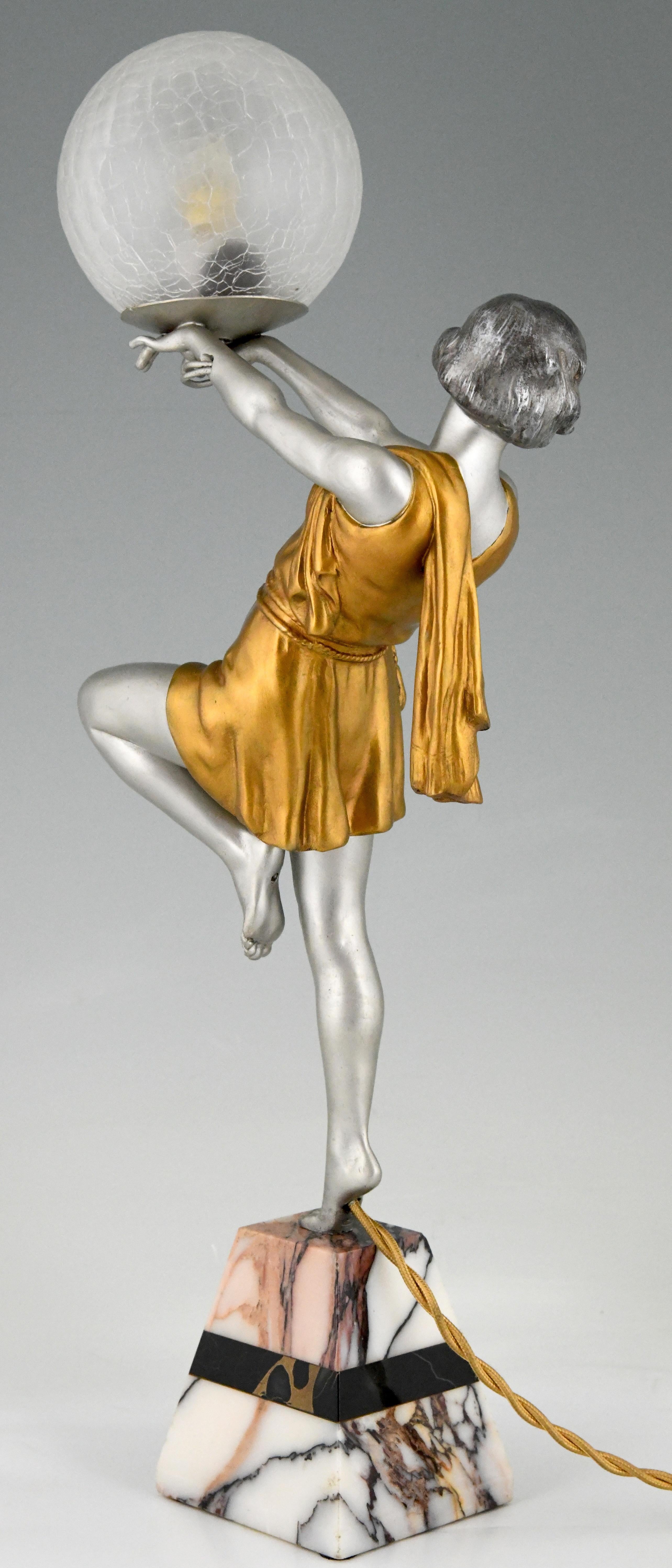 Patinated Art Deco Lamp Lady Holding a Ball Emile Carlier, France, 1930