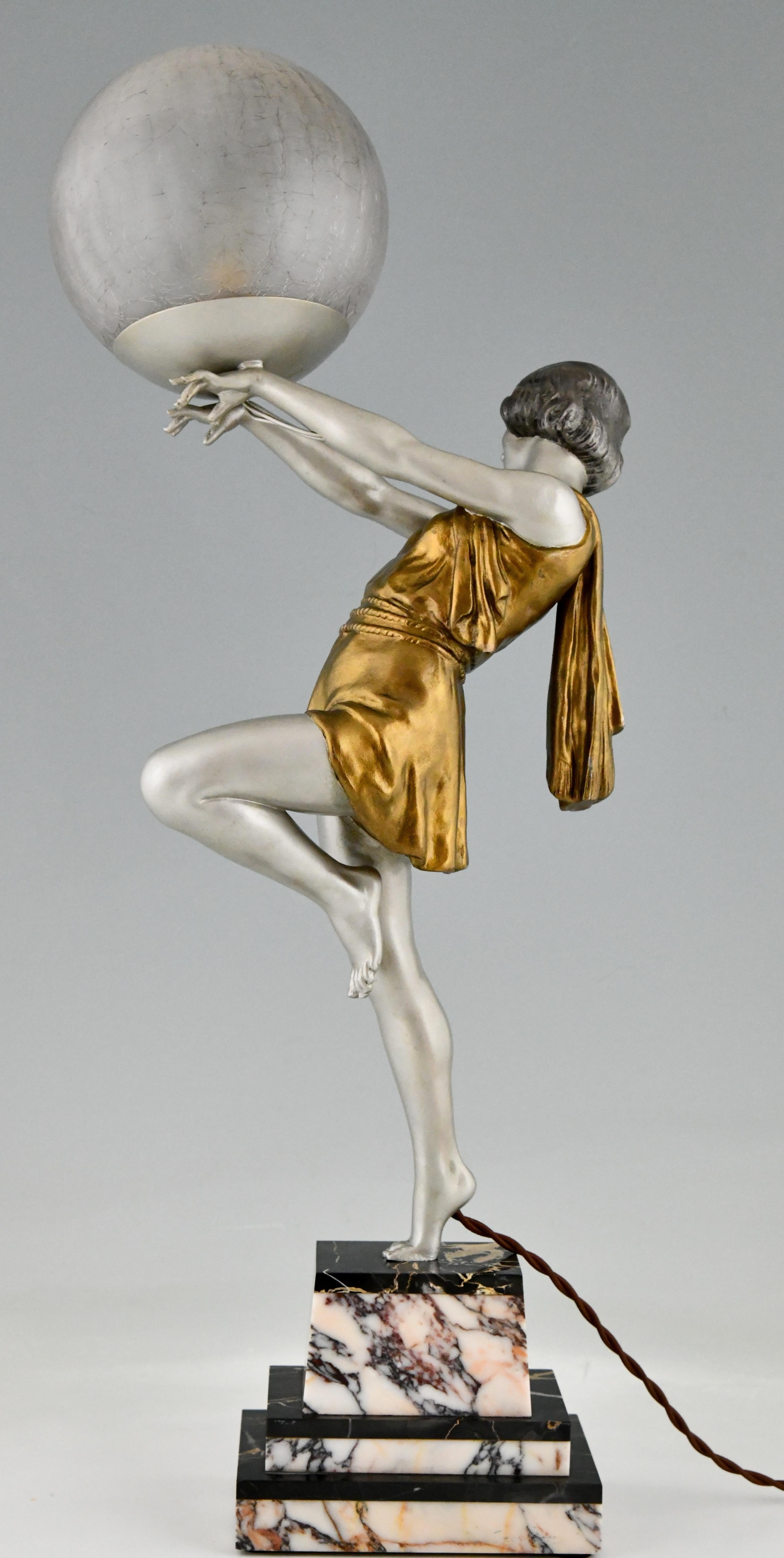 Patinated Art Deco Lamp Lady Holding a Ball Emile Carlier, France, 1930