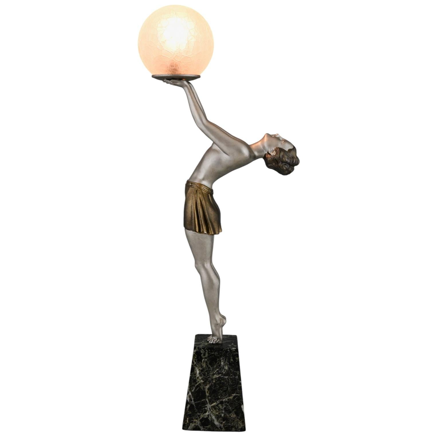 French Art Deco lamp lady holding a glass globe by Enrique Molins Balleste, France 1930 For Sale