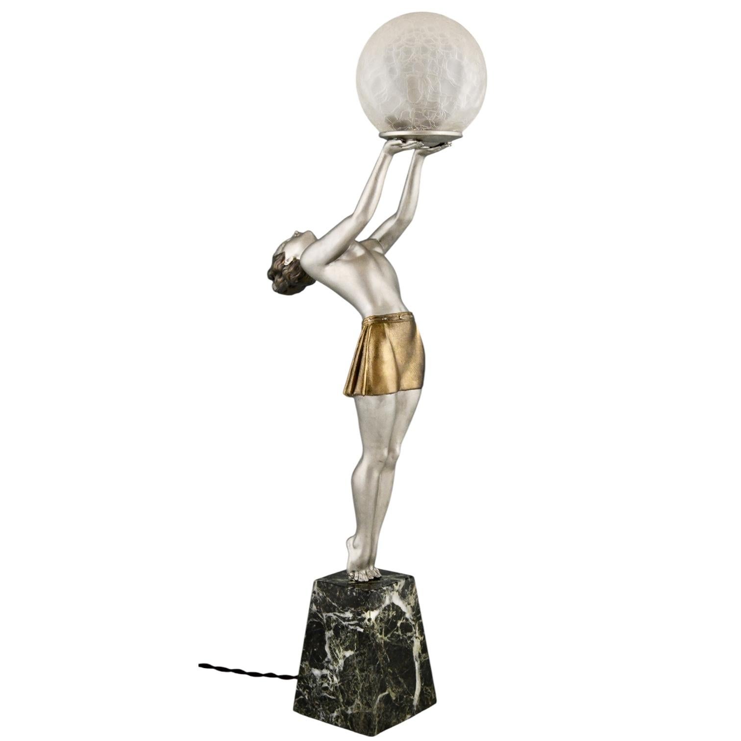 Metal Art Deco lamp lady holding a glass globe by Enrique Molins Balleste, France 1930 For Sale