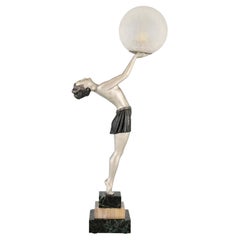Art Deco lamp lady holding a glass globe by Enrique Molins Balleste, France 1930