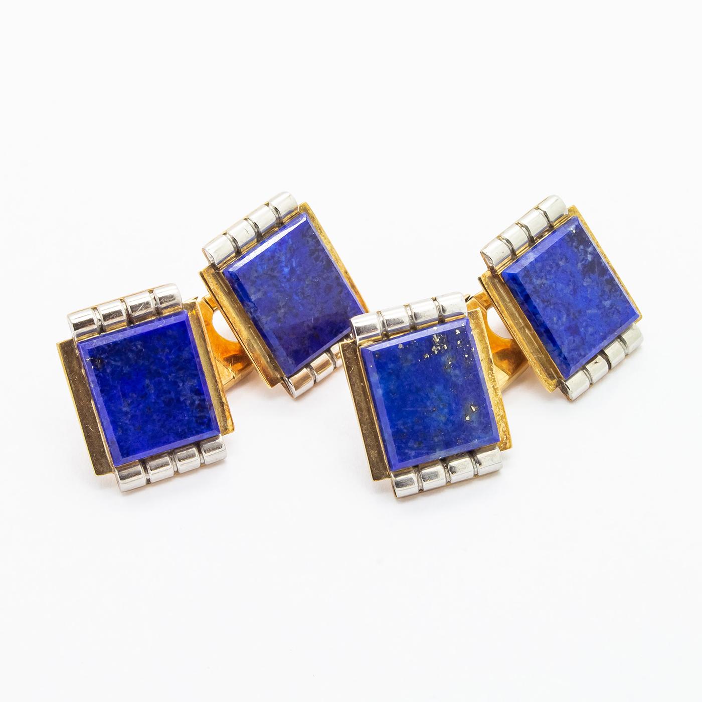 A pair of Art Deco, lapis lazuli and gold cufflinks, each set with flat, rectangular lapis lazuli, on yellow gold plates, with white gold bars at each end, divided into four, mounted in 14ct gold, with marks for Poland, with chain link fittings,