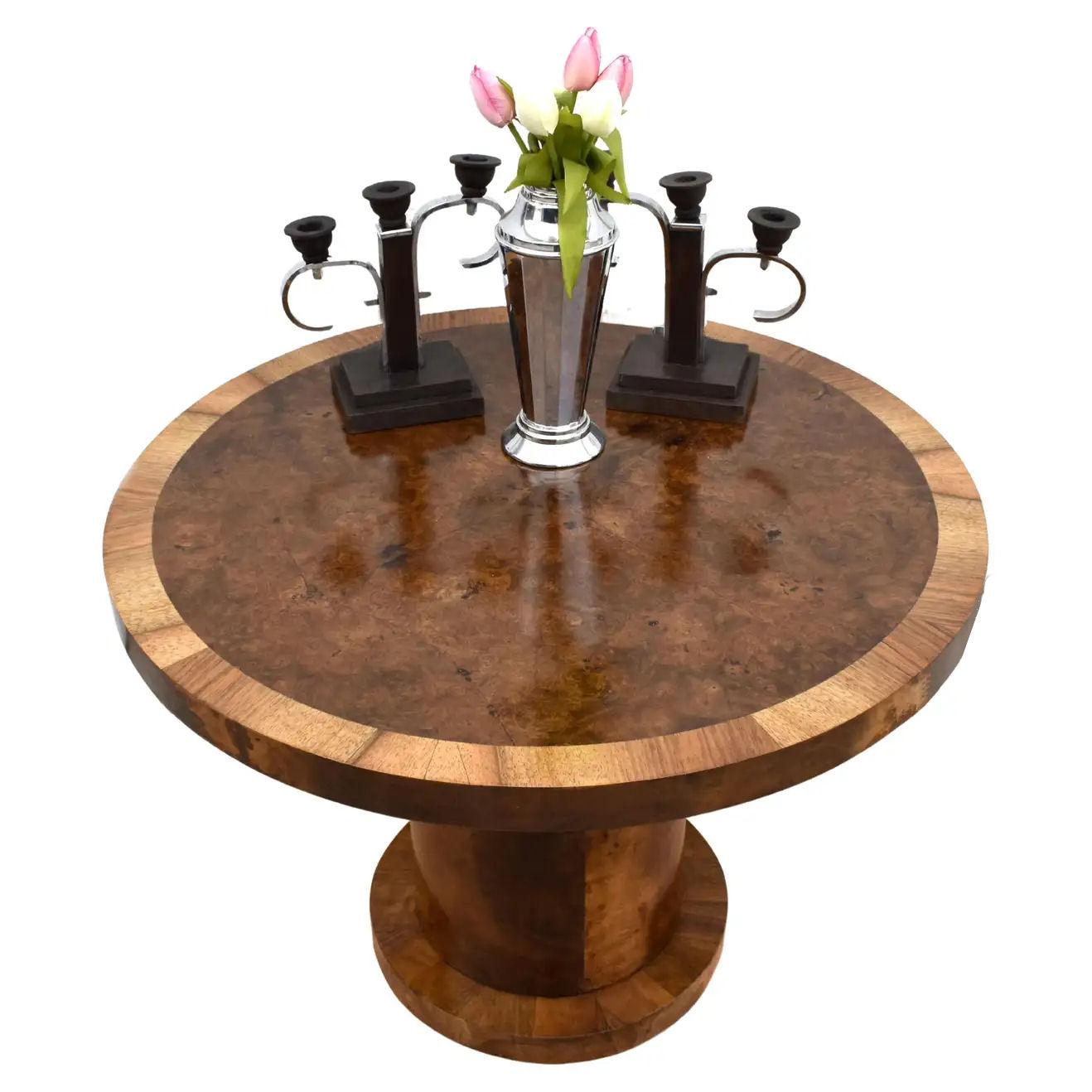 Very stylish and totally authentic English Art Deco Walnut center table dating to the 1930's. This table is beautifully shaped and fully restored to showroom condition. Typically larger than occasional coffee tables, these make ideal pieces to make