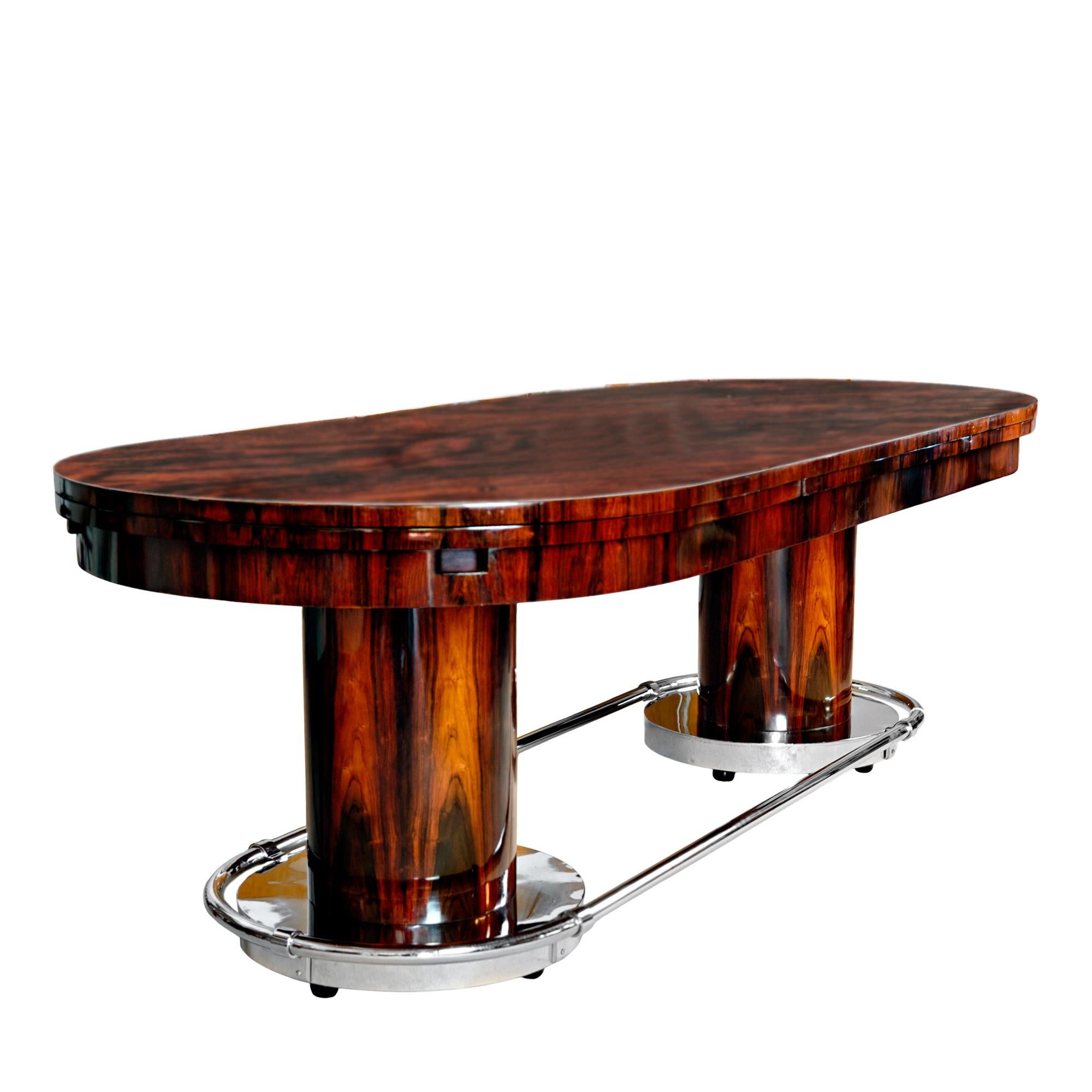 Spectacular Art Deco large oval ‘ocean liner’ table with extensions, in solid wood with mahogany veneer. Resting on two columns sets on their nickel-plated brass bases and joined by a nickel-plated tube. Exceptional quality and dimensions. French
