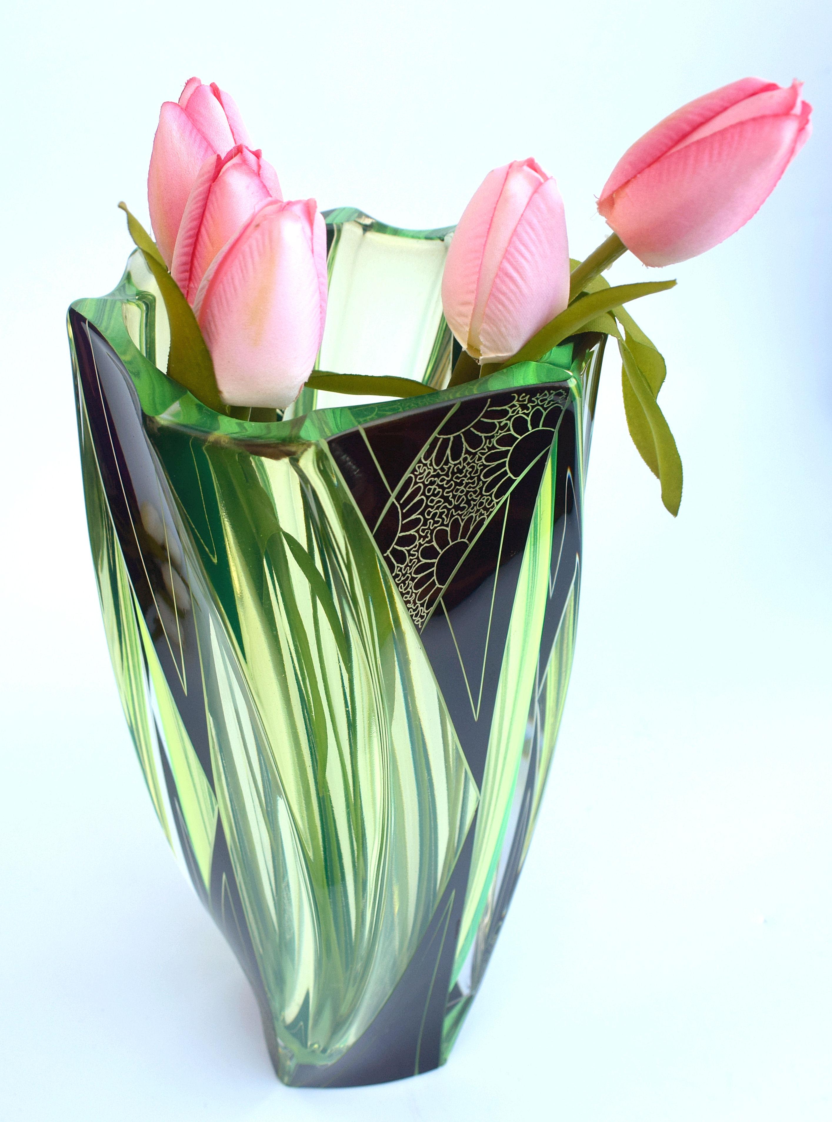 This is without doubt one of our all time favourite Art Deco vases. Originating from Czech republic and made by Karl Palda this vase packs two punches, not only visually with it's very distinctive green / yellow colouring with jet black enamel