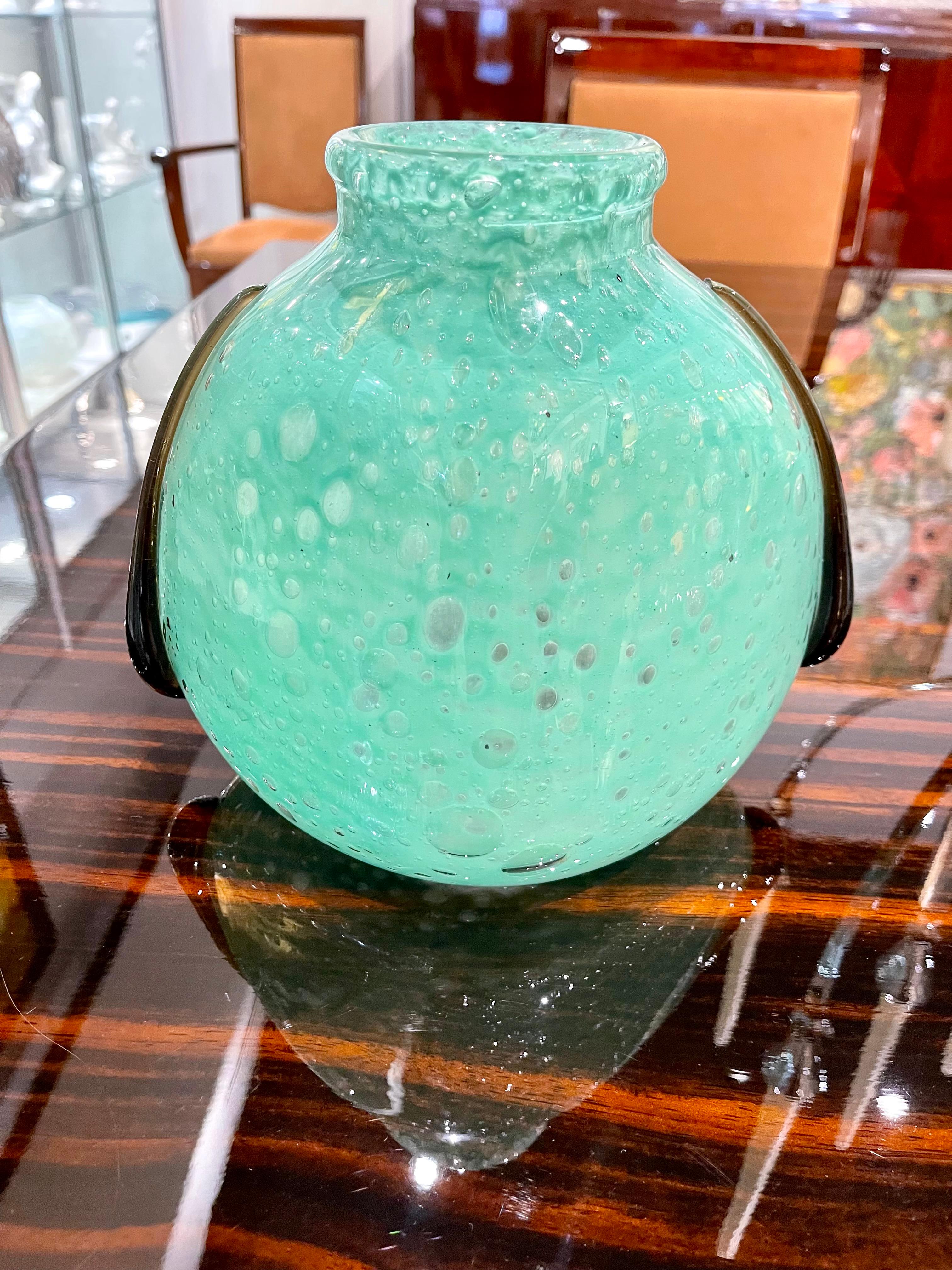 Art Deco glass by Charles Schneider part of Larmes (Tears) series in beautiful green jade color with deep smoky colored glass tears decoration along the body.
Made in France.
Circa: 1925
Signature: 