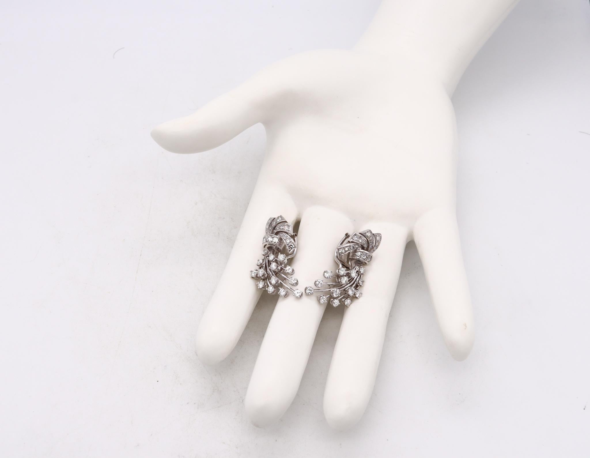 An Art Deco pair of jeweled clips on earrings in platinum.

Very handsome vintage pieces from the American art-deco period, circa 1930-1940. This jeweled pair of earrings was carefully crafted in solid .900/.999 platinum, with .100/.999 iridium. The
