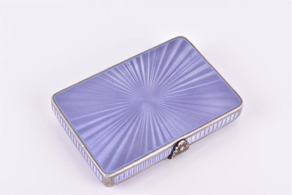 A lovely early 20th-century small lavender guilloche enamel silver box made for the English market. 

The silver box with beautiful, guilloche enameling in the most mesmerizing lavender color. The concentric wave pattern machined extremely tightly,