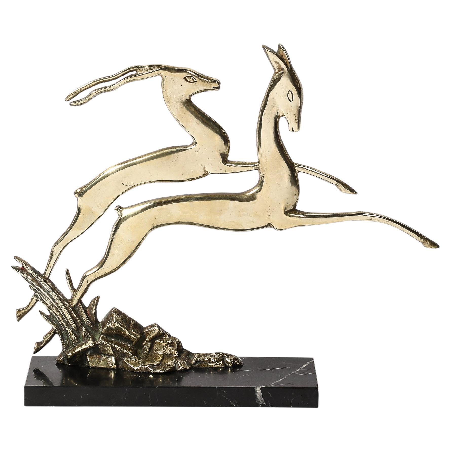 Art Deco Leaping Gazelle Sculpture in Polished Brass on Black Marble Base For Sale