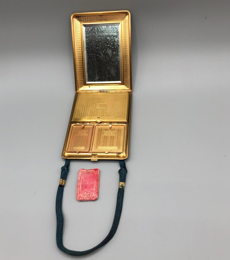 Art Deco Leather Book Style Powder Compact with wrist strap by Mondaine  1920's For Sale at 1stDibs | mondaine compact, mondaine makeup compact,  mondaine vintage makeup