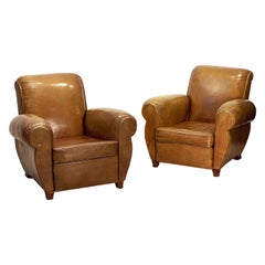 Art Deco Leather Club Chairs from France 
Priced as a Pair

